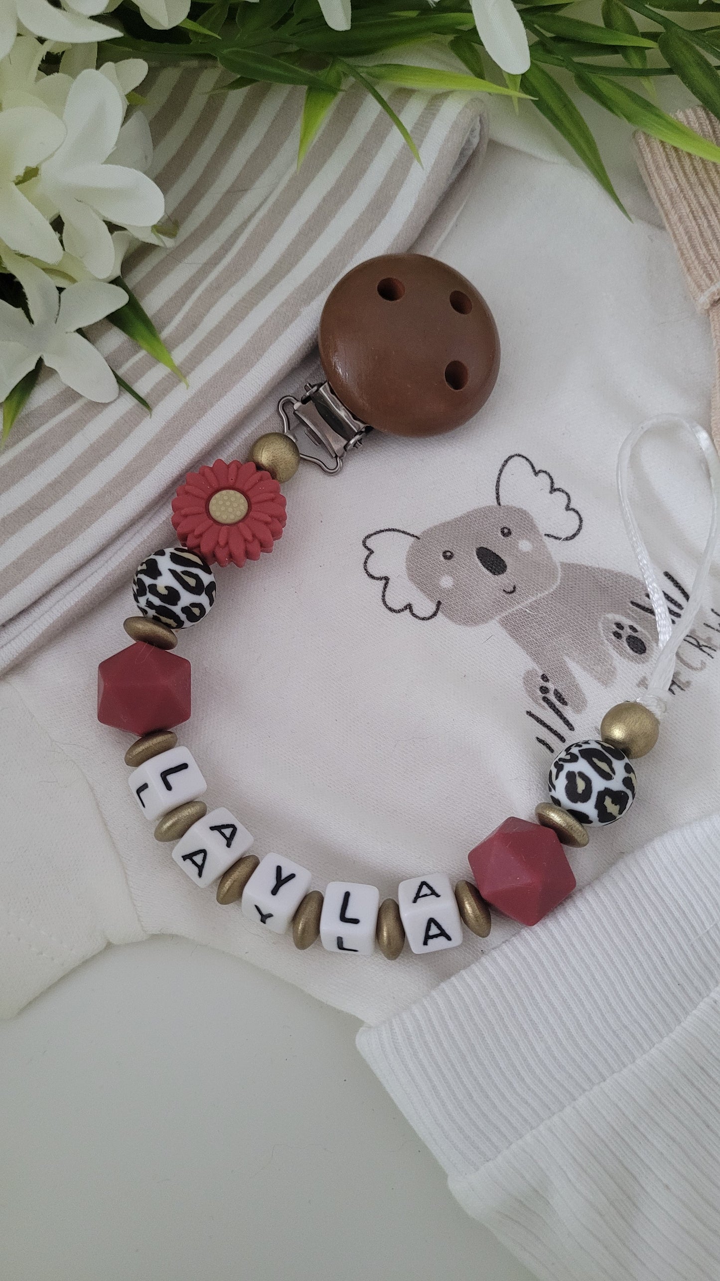 Schnullerkette mit Namen für Mädchen Blümchen leo braun