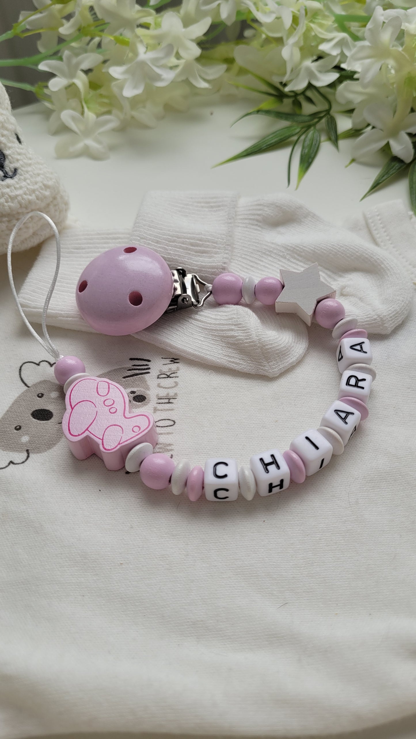 Schnullerkette mit Namen für Mädchen Flieger rosa weiß