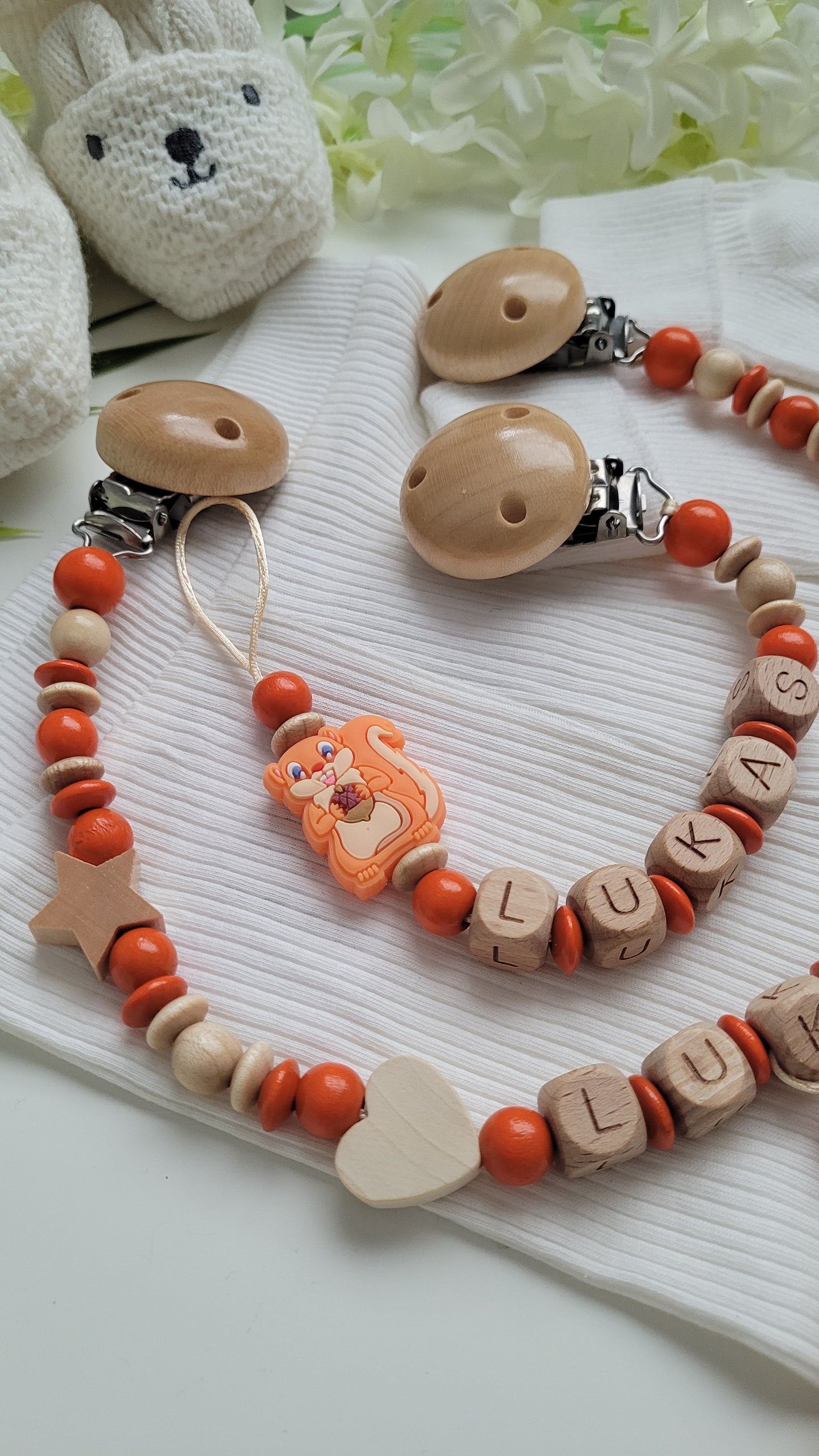 Kinderwagenkette & Schnullerkette Eichhörnchen Holz Orange