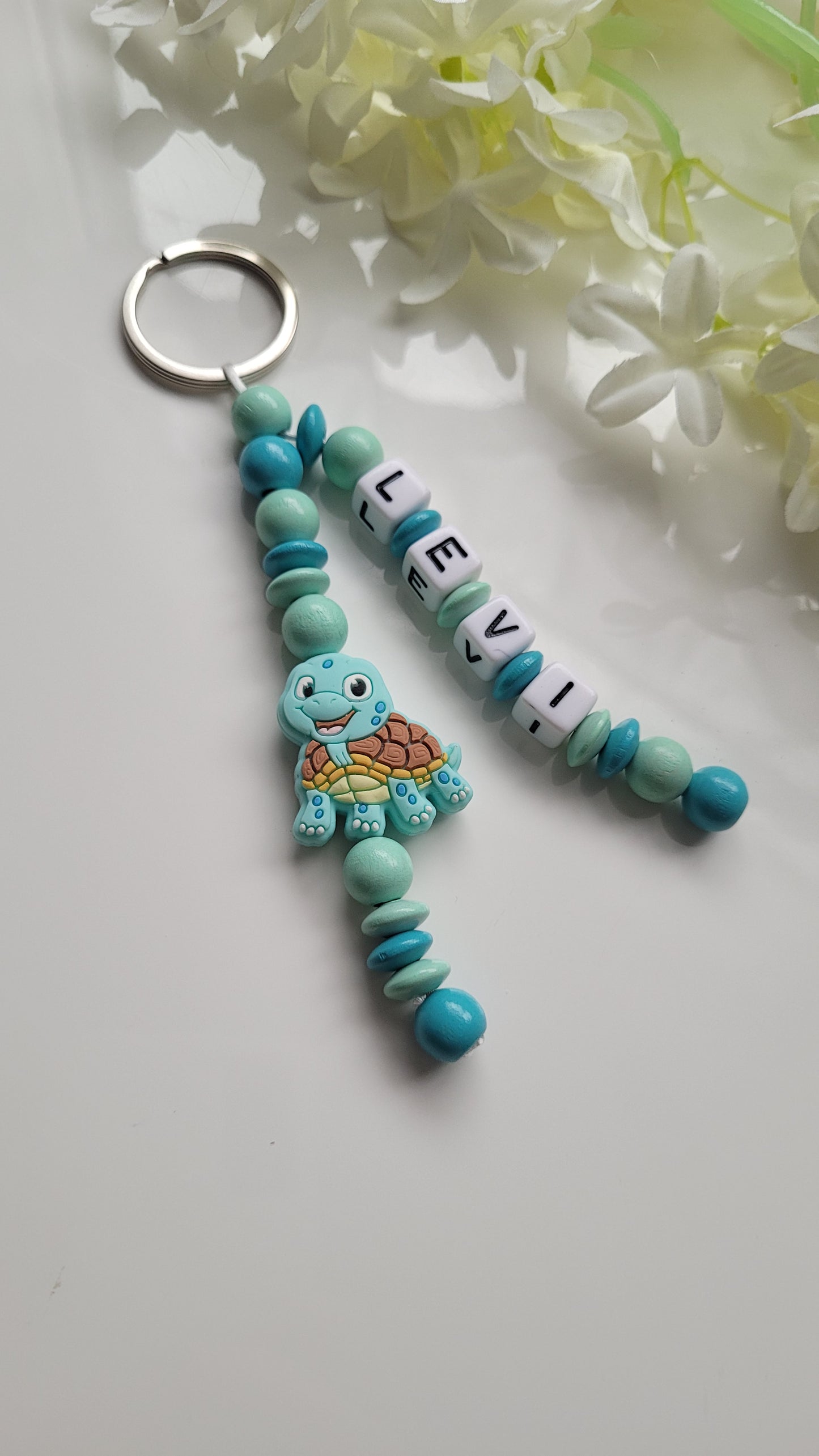 Schlüsselanhänger mit Namen türkis Motivauswahl