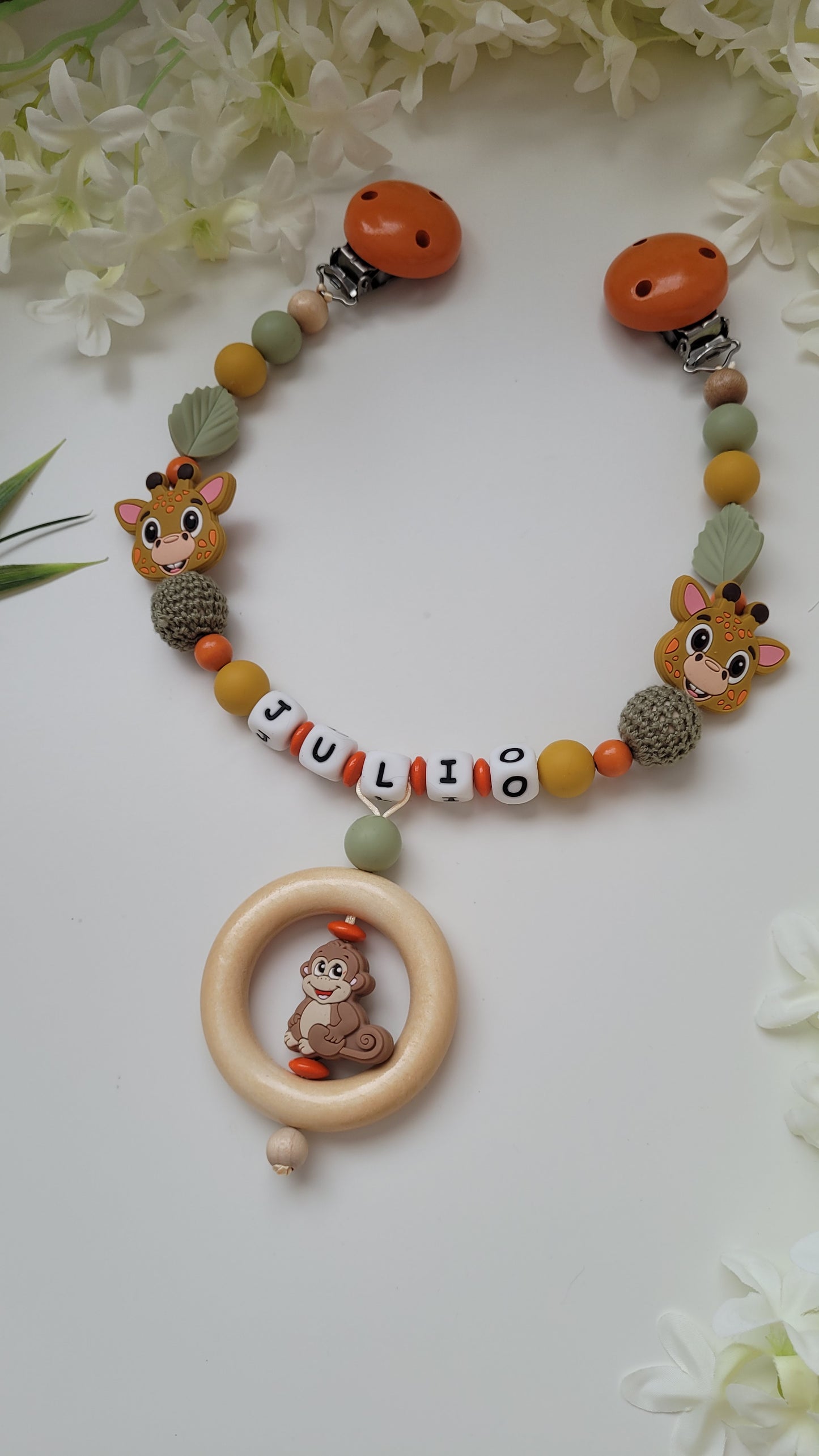 Kinderwagenkette & Schnullerkette Silikon *Zoo* orange grün Spielring