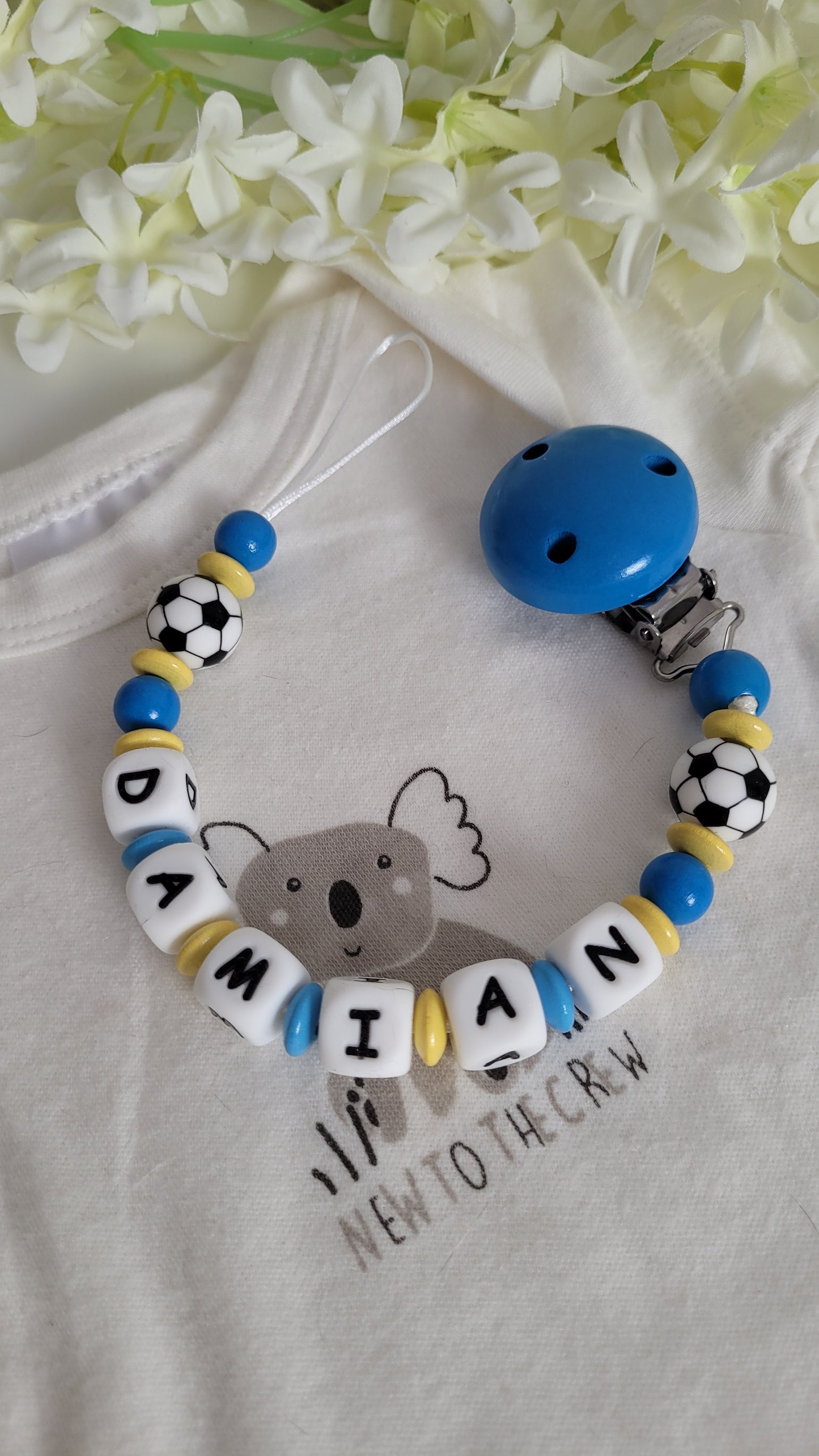 Schnullerkette *Fußball* blau gelb