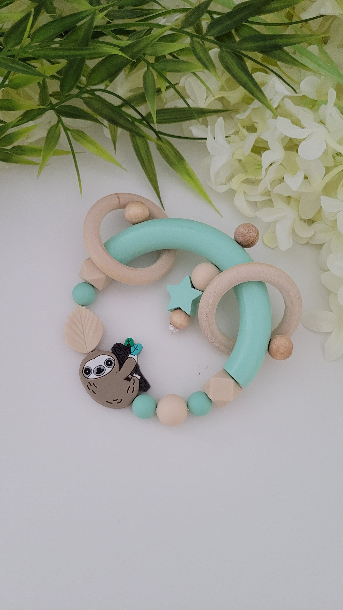 Motorik Greifring * Faultier* mint beige