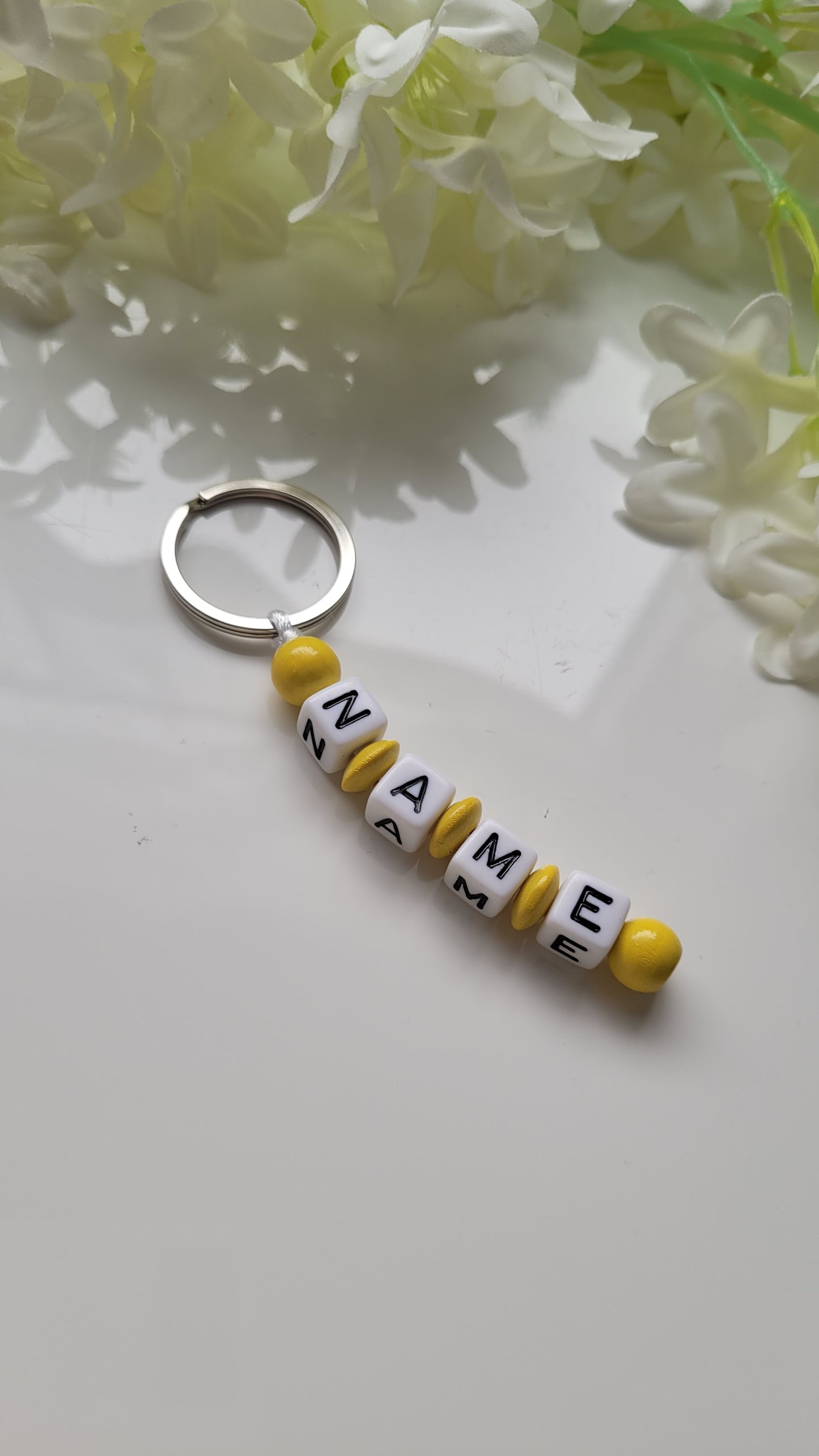 Schlüsselanhänger mit Namen gelb