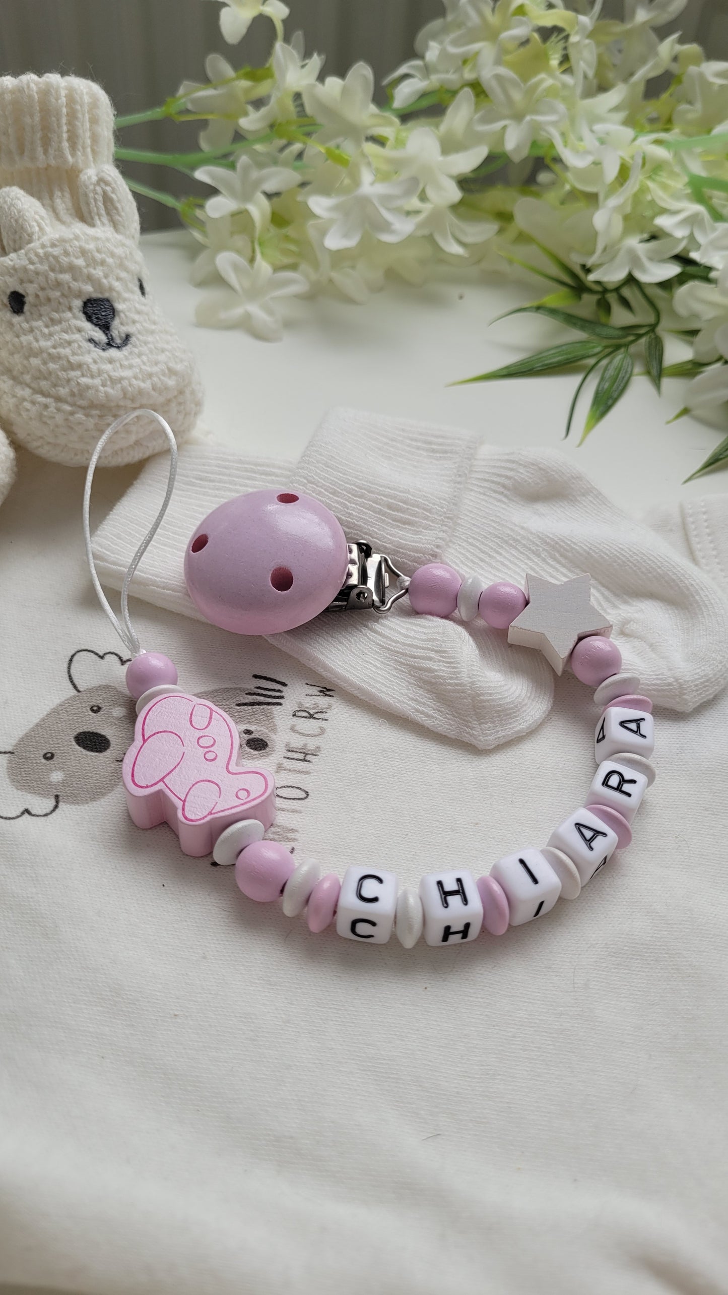 Schnullerkette mit Namen für Mädchen Flieger rosa weiß