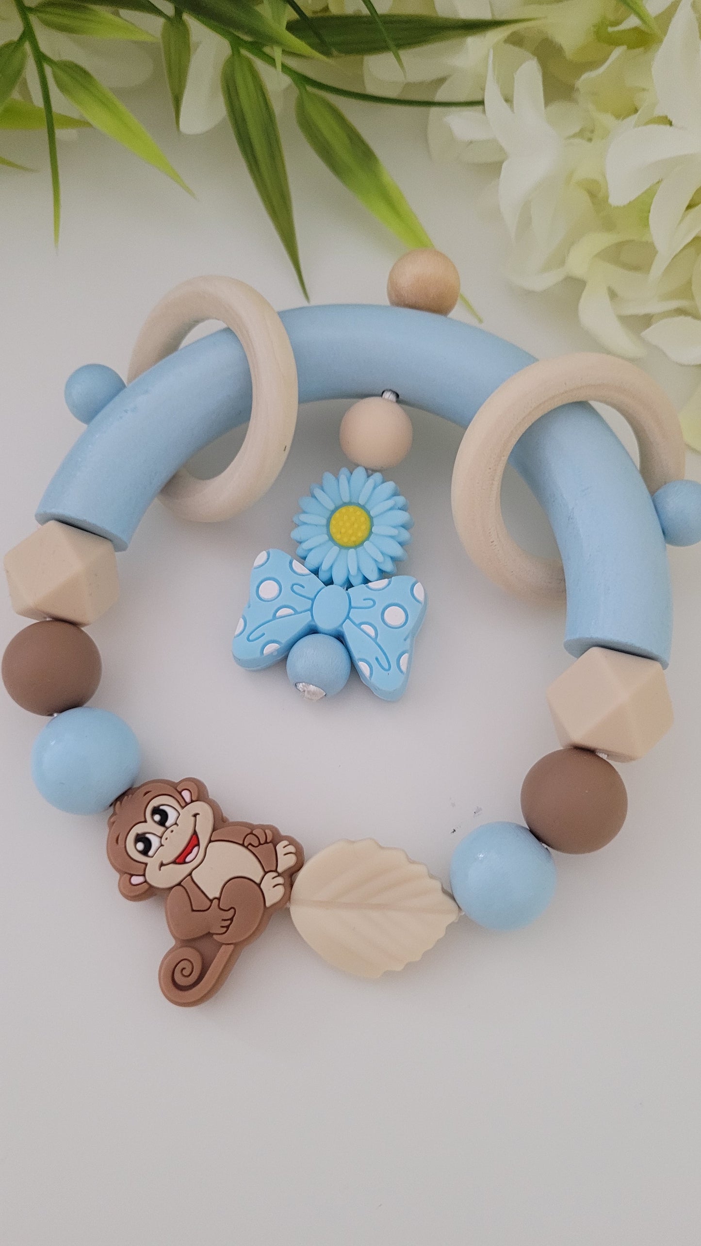 Motorik Greifring * Äffchen* hellblau beige