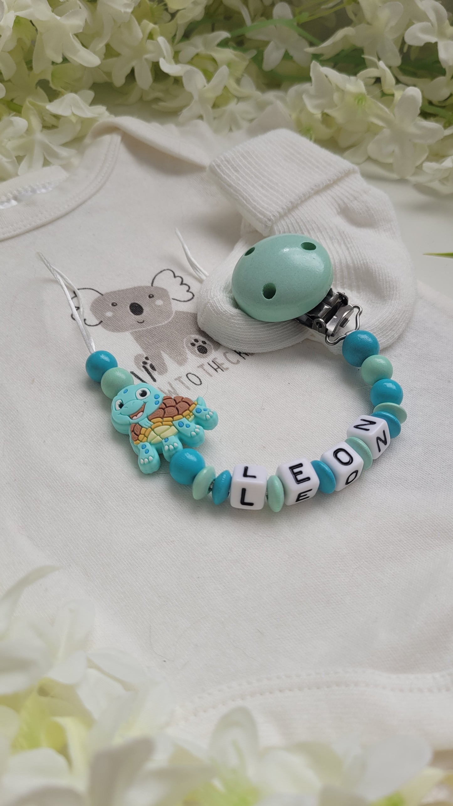 Schnullerkette mit Namen Schildkröte mint türkis