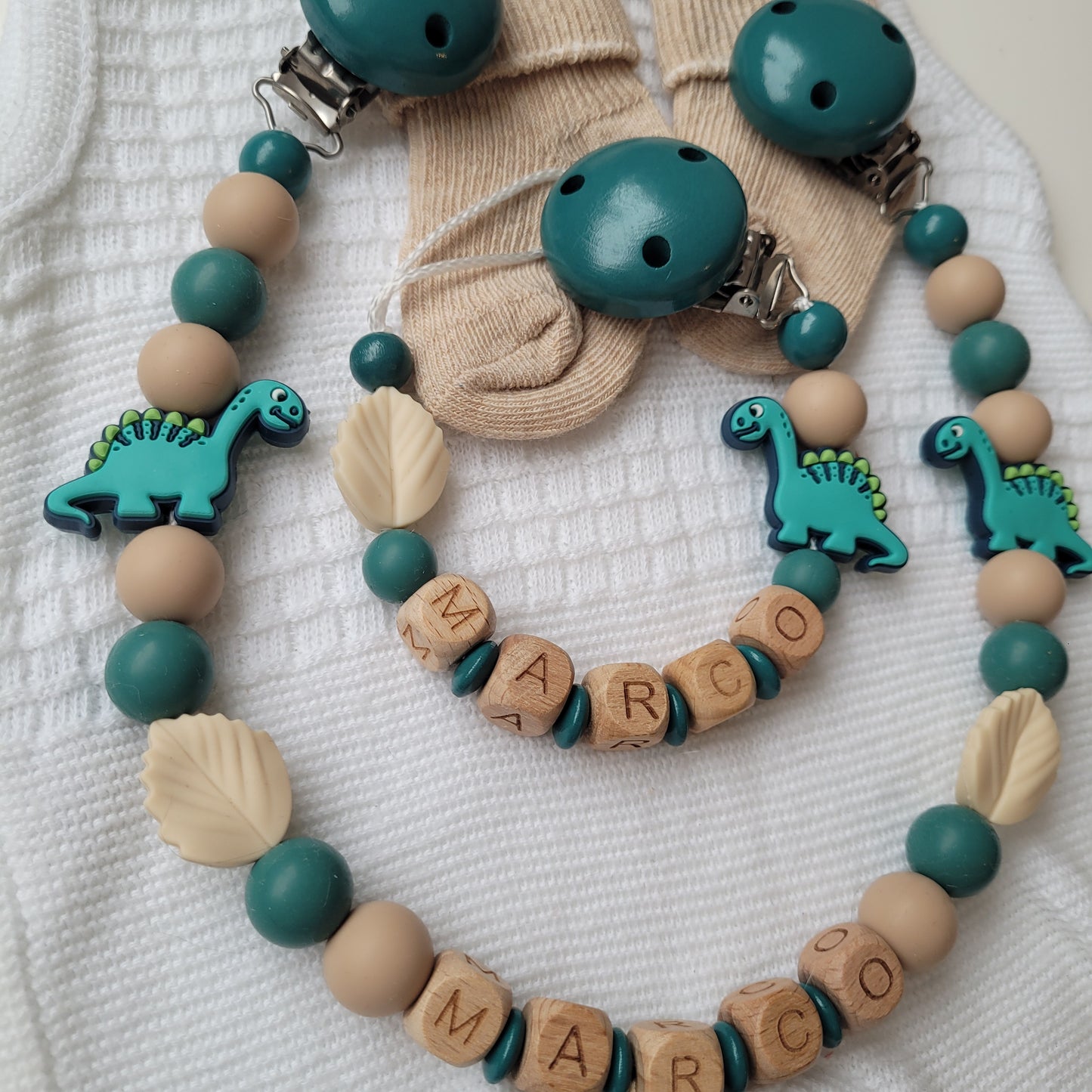 Kinderwagenkette & Schnullerkette mit Namen Dino petrol holz