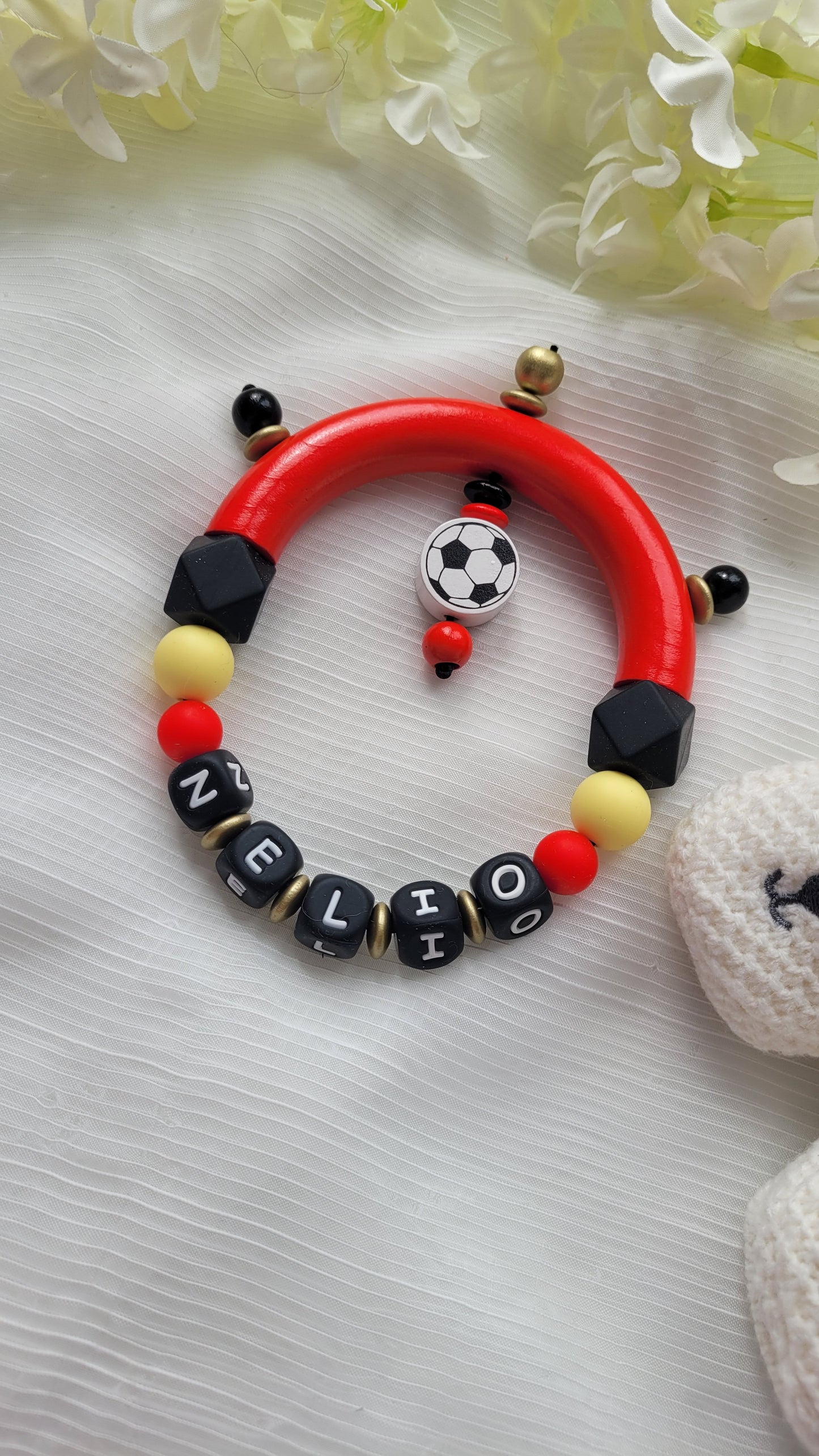 Motorik Greifring mit Namen Fussball