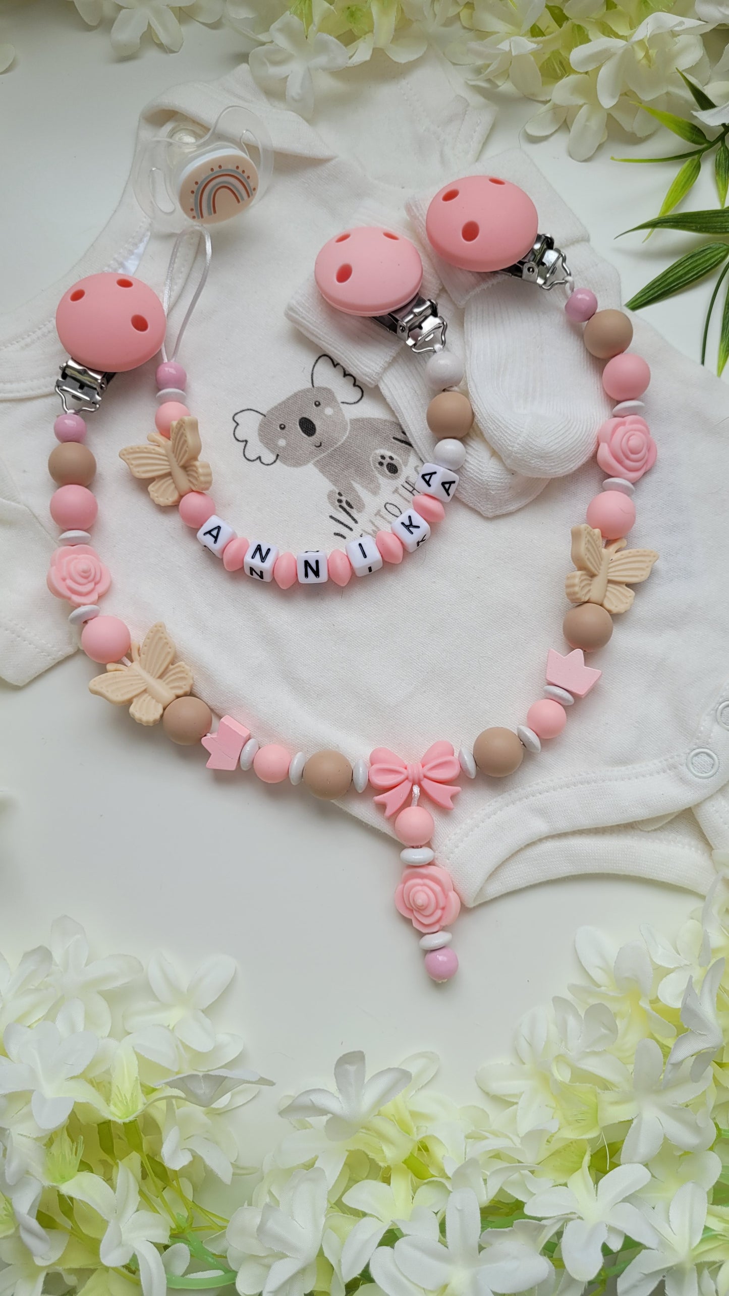 Kinderwagenkette & Schnullerkette *Schmetterling* beige apricot