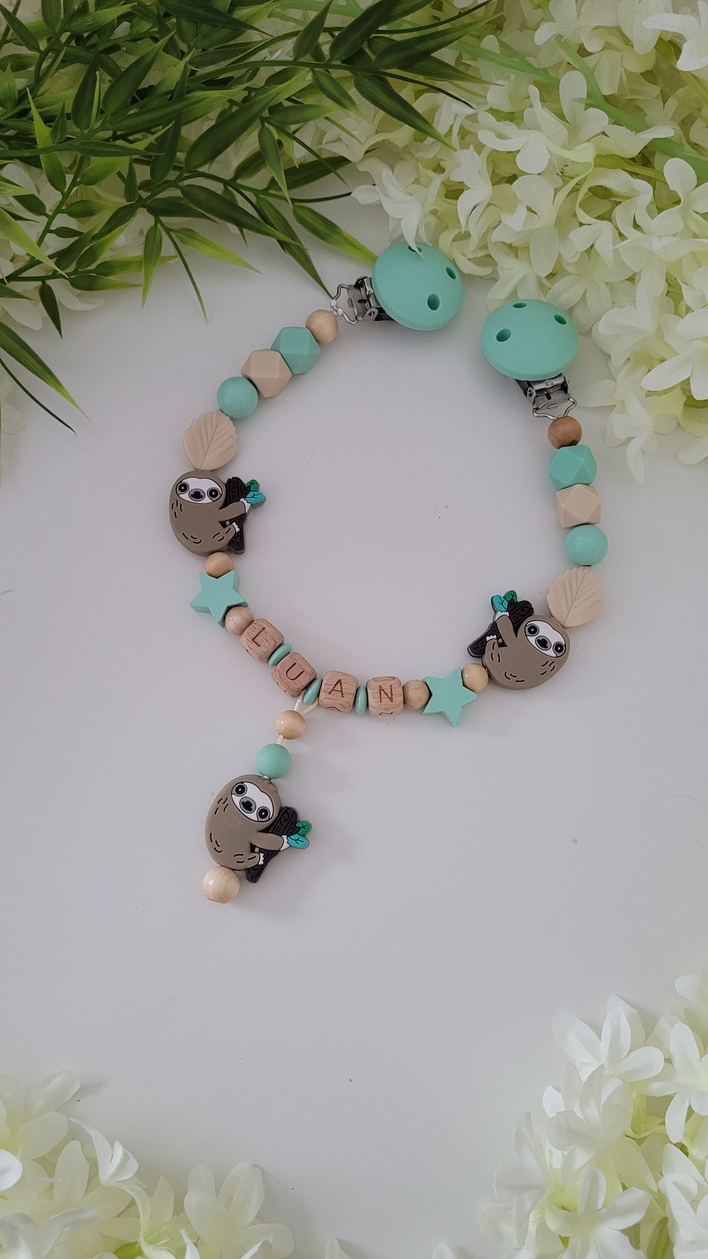 Kinderwagenkette & Schnullerkette *Faultier* mint