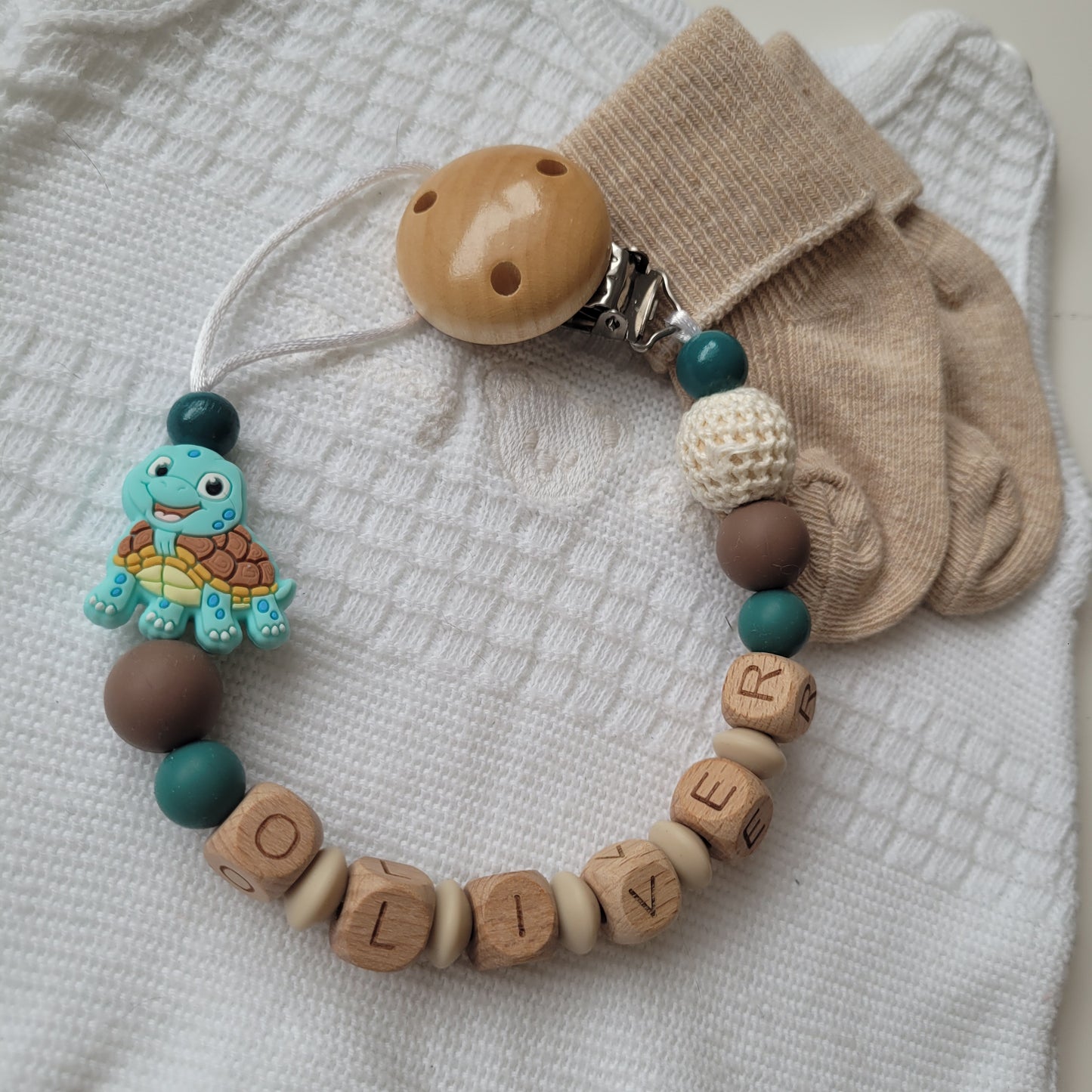 Schnullerkette für Jungen mit Namen Schildkröte petrol