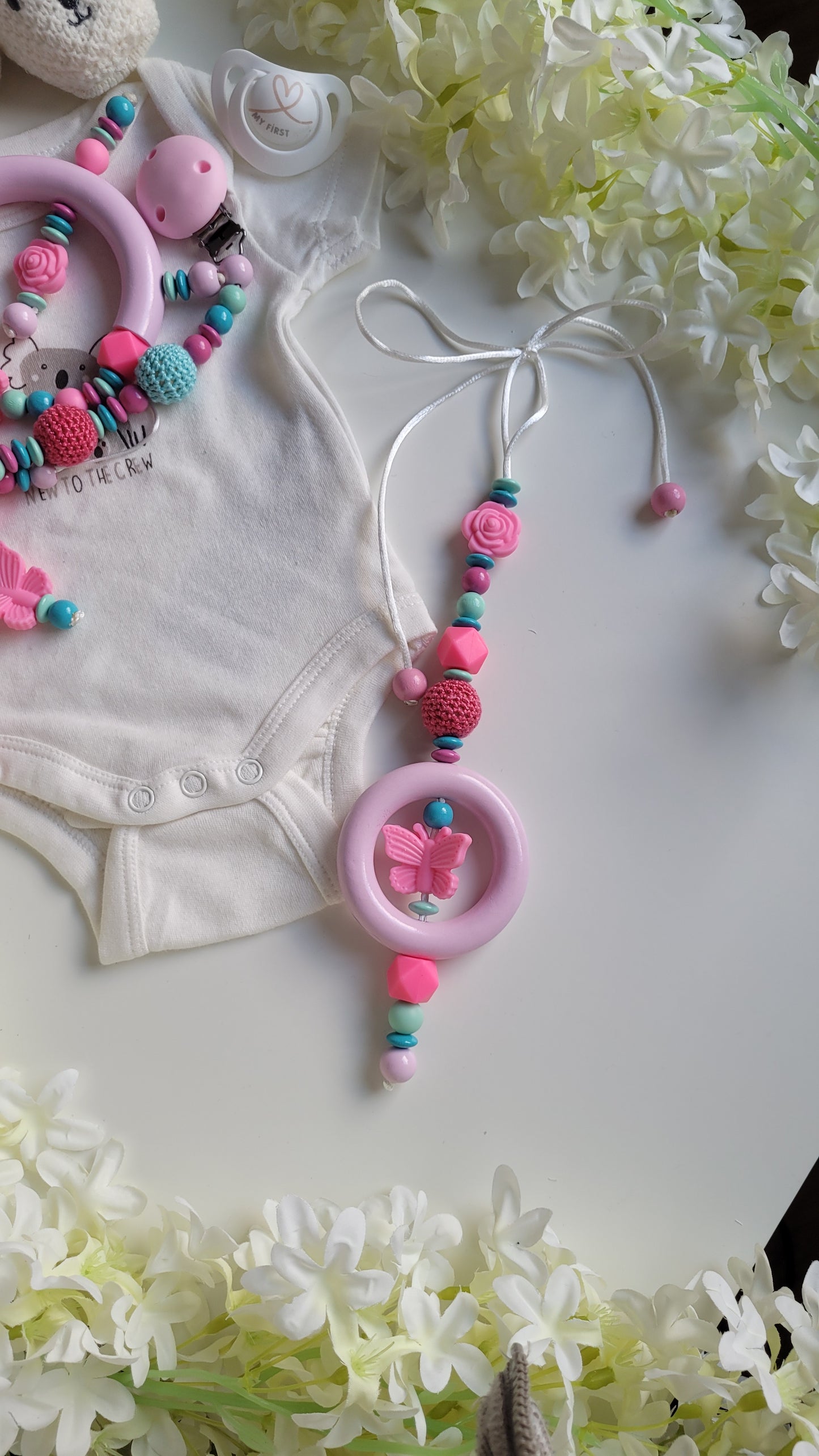 Spielanhänger für Maxicosi & Wiege Schmetterling Rosen türkis mint pink