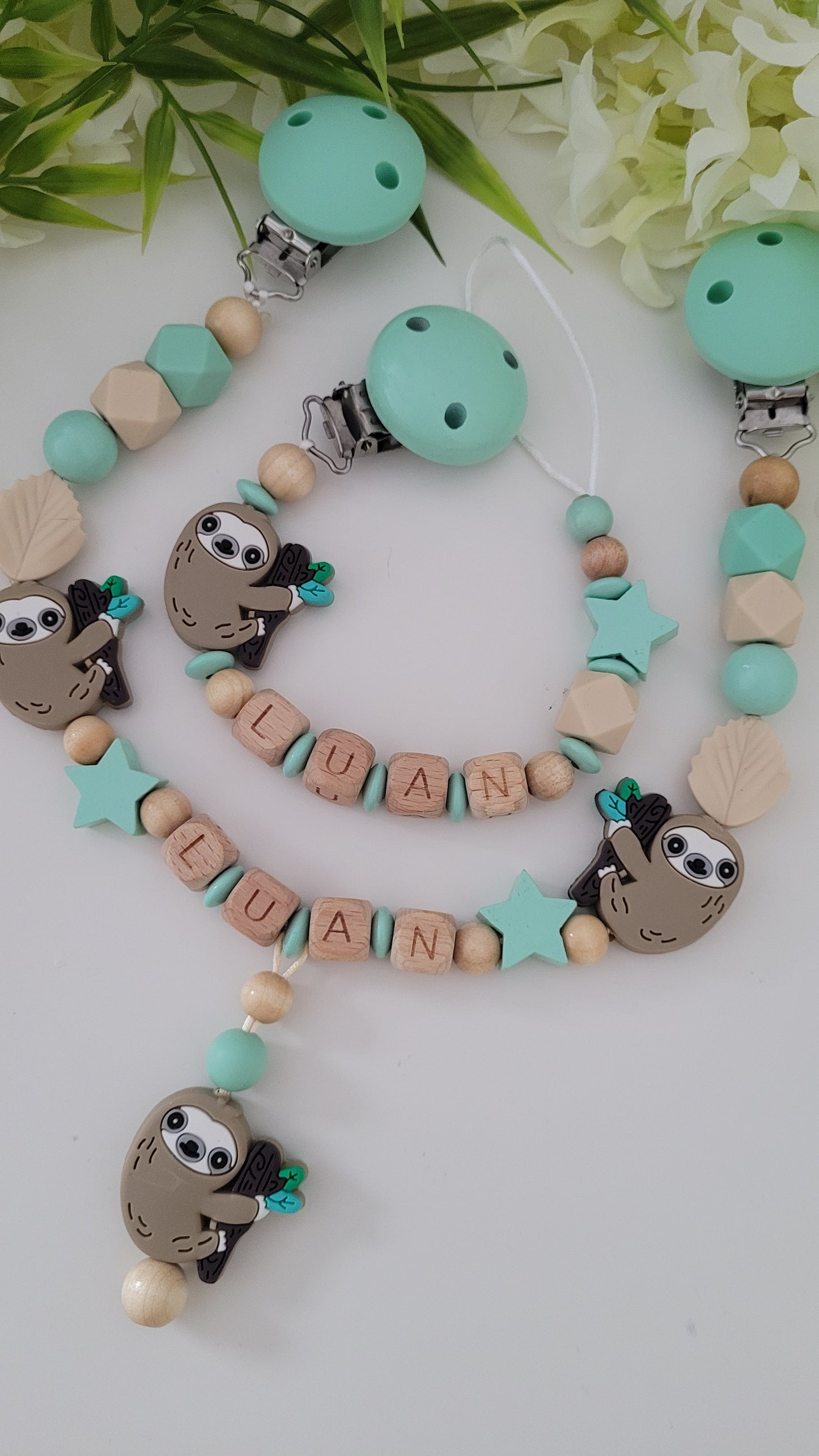 Kinderwagenkette & Schnullerkette *Faultier* mint