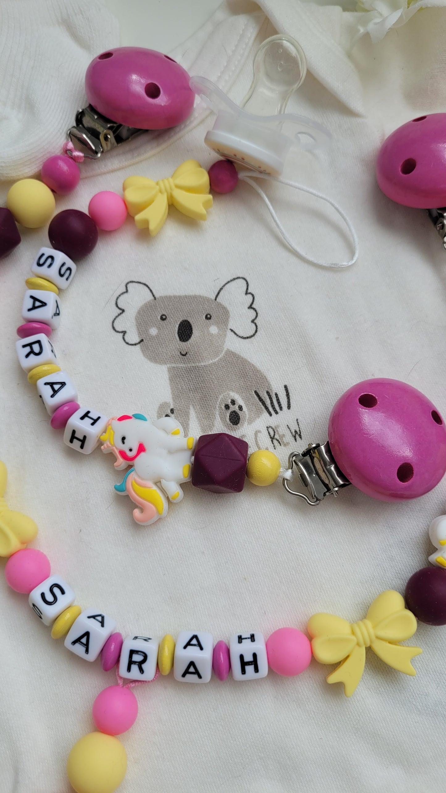 Kinderwagenkette & Schnullerkette Einhorn Regenbogen