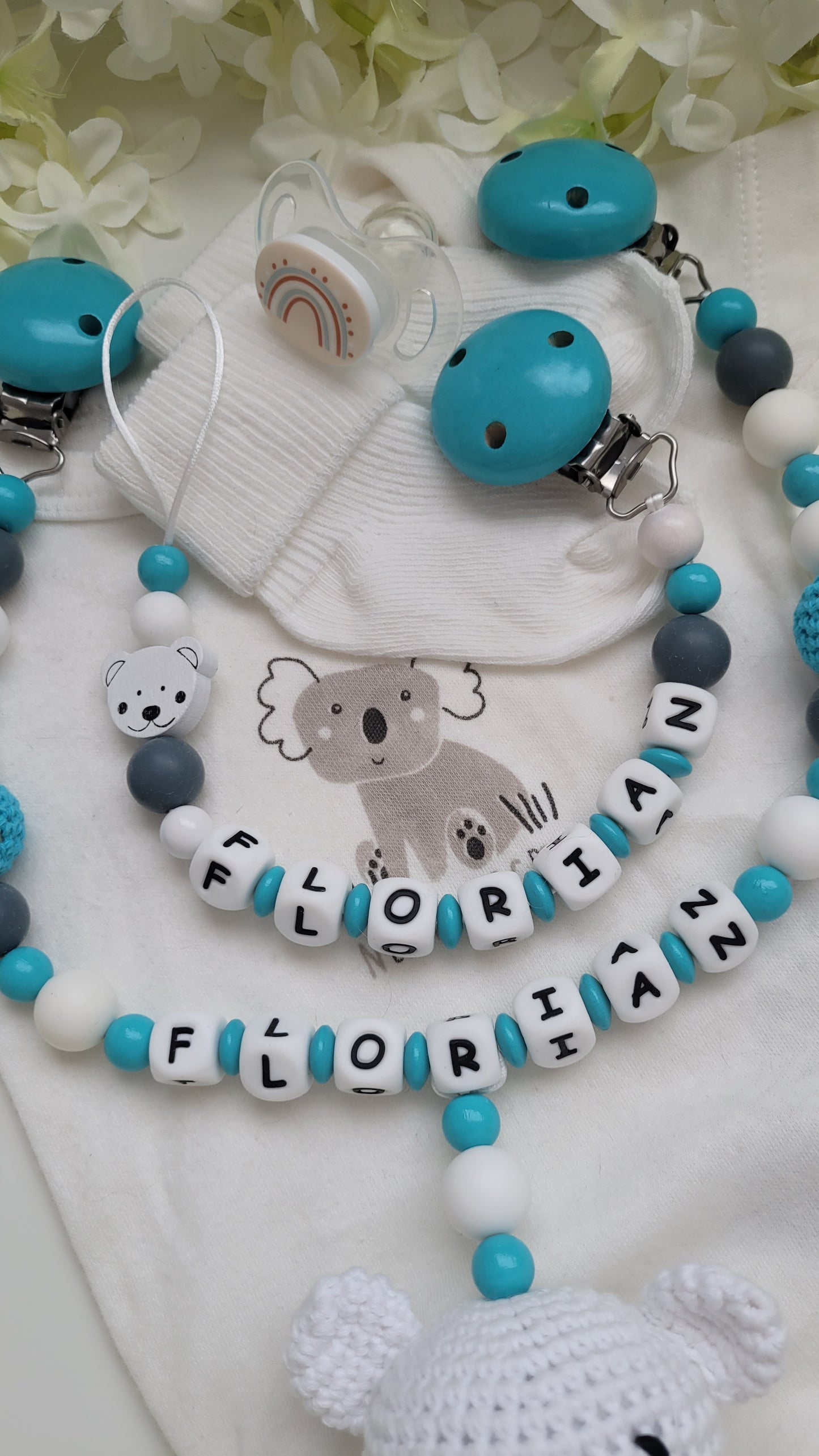 Kinderwagenkette & Schnullerkette Teddybär türkis