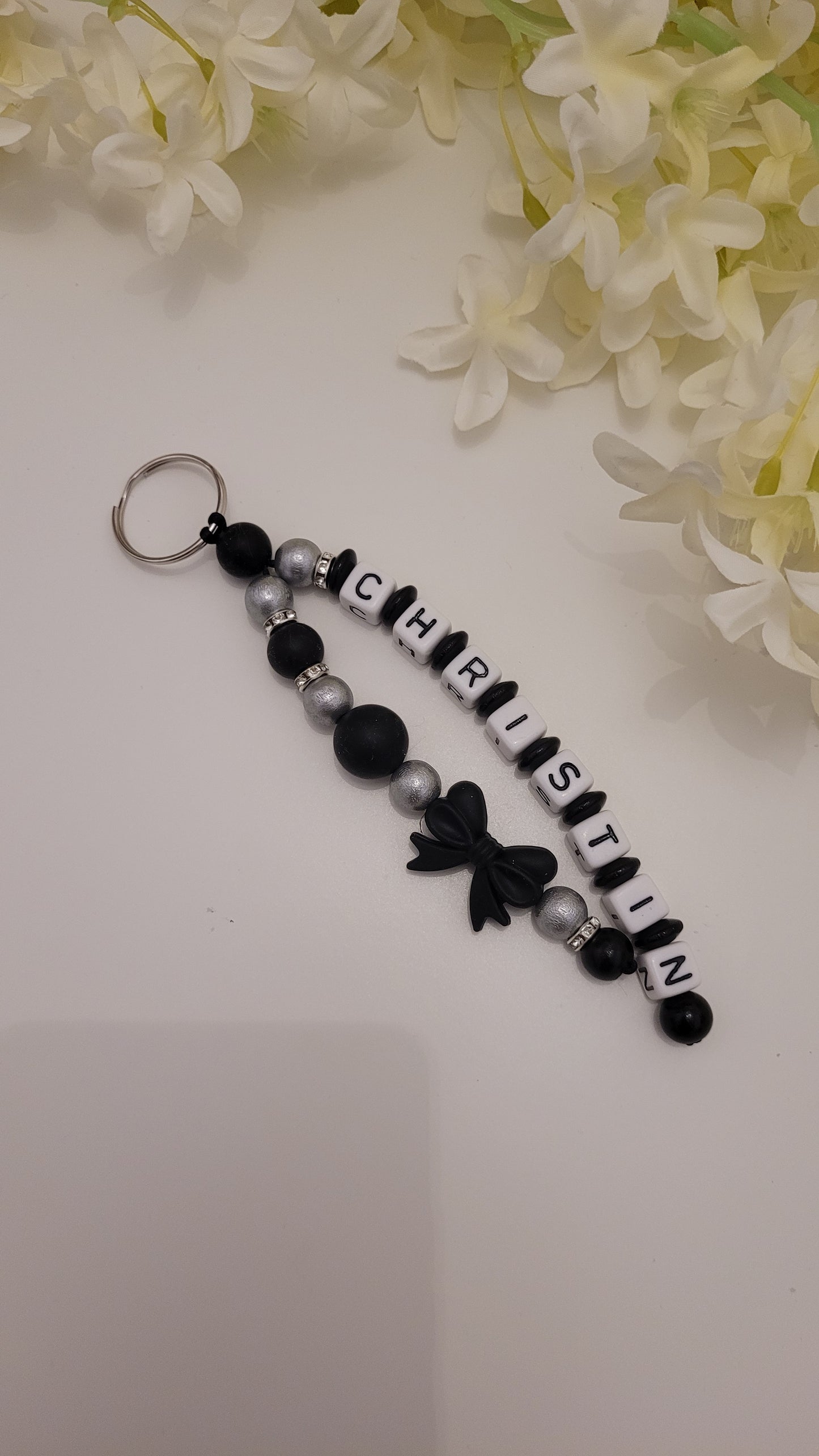 Schlüsselanhänger mit Namen schwarz silber Strass