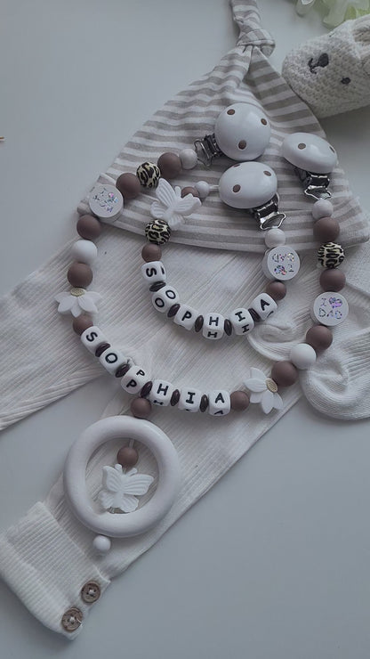 Kinderwagenkette & Schnullerkette mit Namen  Schmetterling Braun weiß