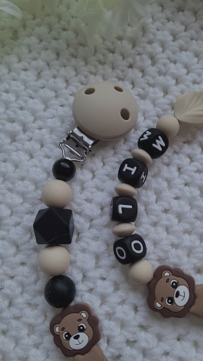 Kinderwagenkette & Schnullerkette Set Baby Löwe beige schwarz