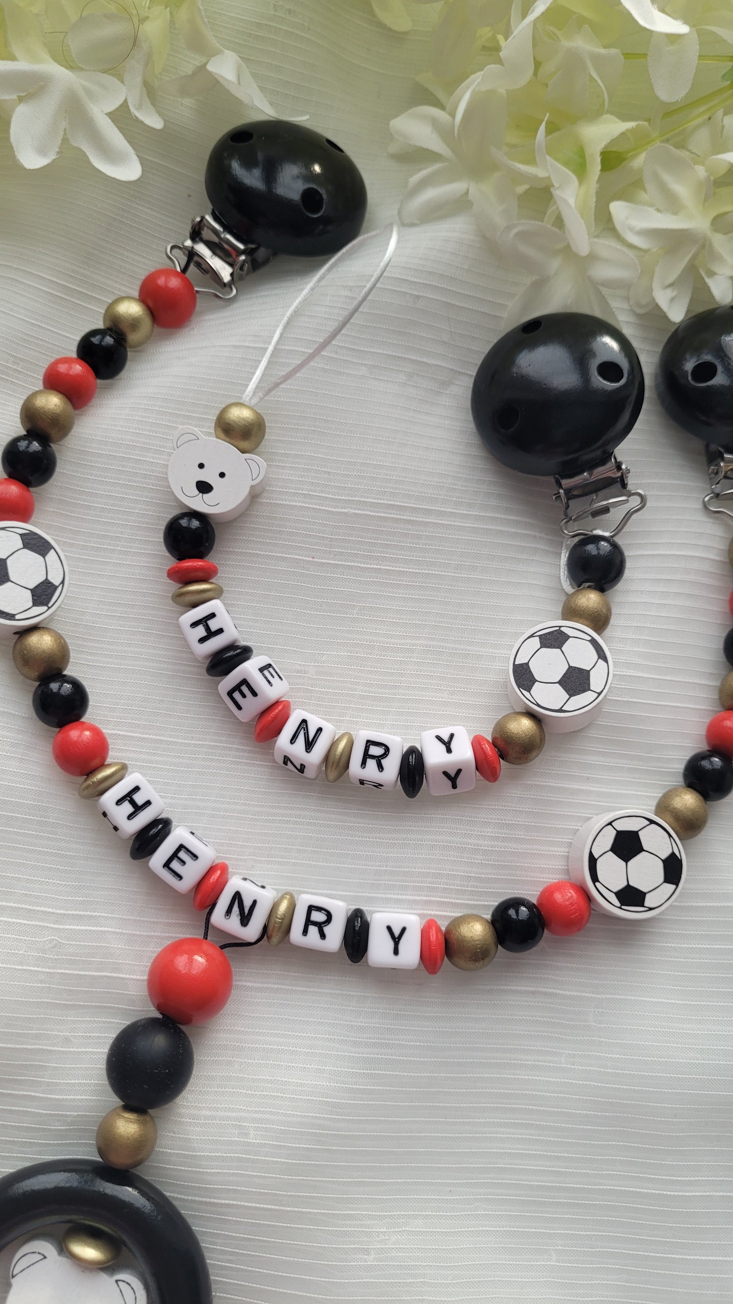 Kinderwagenkette & Schnullerkette mit Namen  Fussball schwarz rot gold