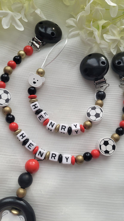 Kinderwagenkette & Schnullerkette mit Namen  Fussball schwarz rot gold