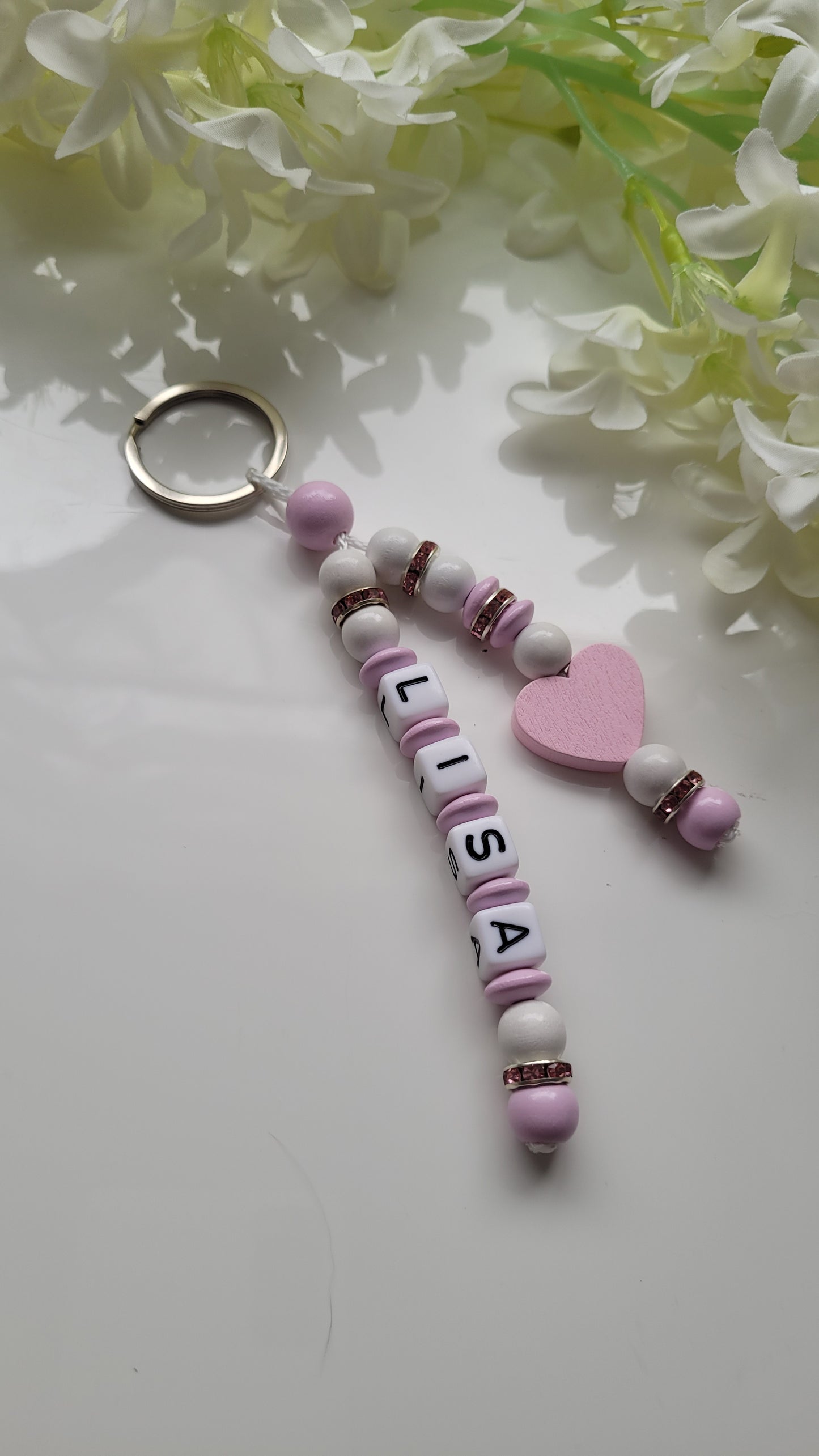 Schlüsselanhänger mit Namen rosa weiss Strass