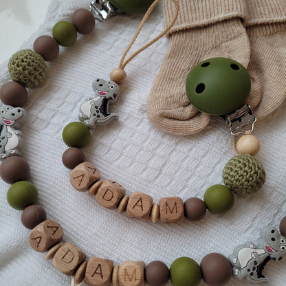 Kinderwagenkette & Schnullerkette mit Namen Dino grün holz braun
