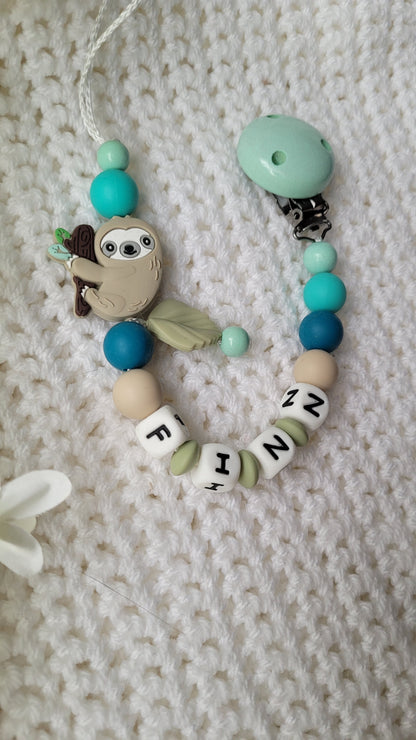 Schnullerkette für Jungen mit Namen Faultier türkis