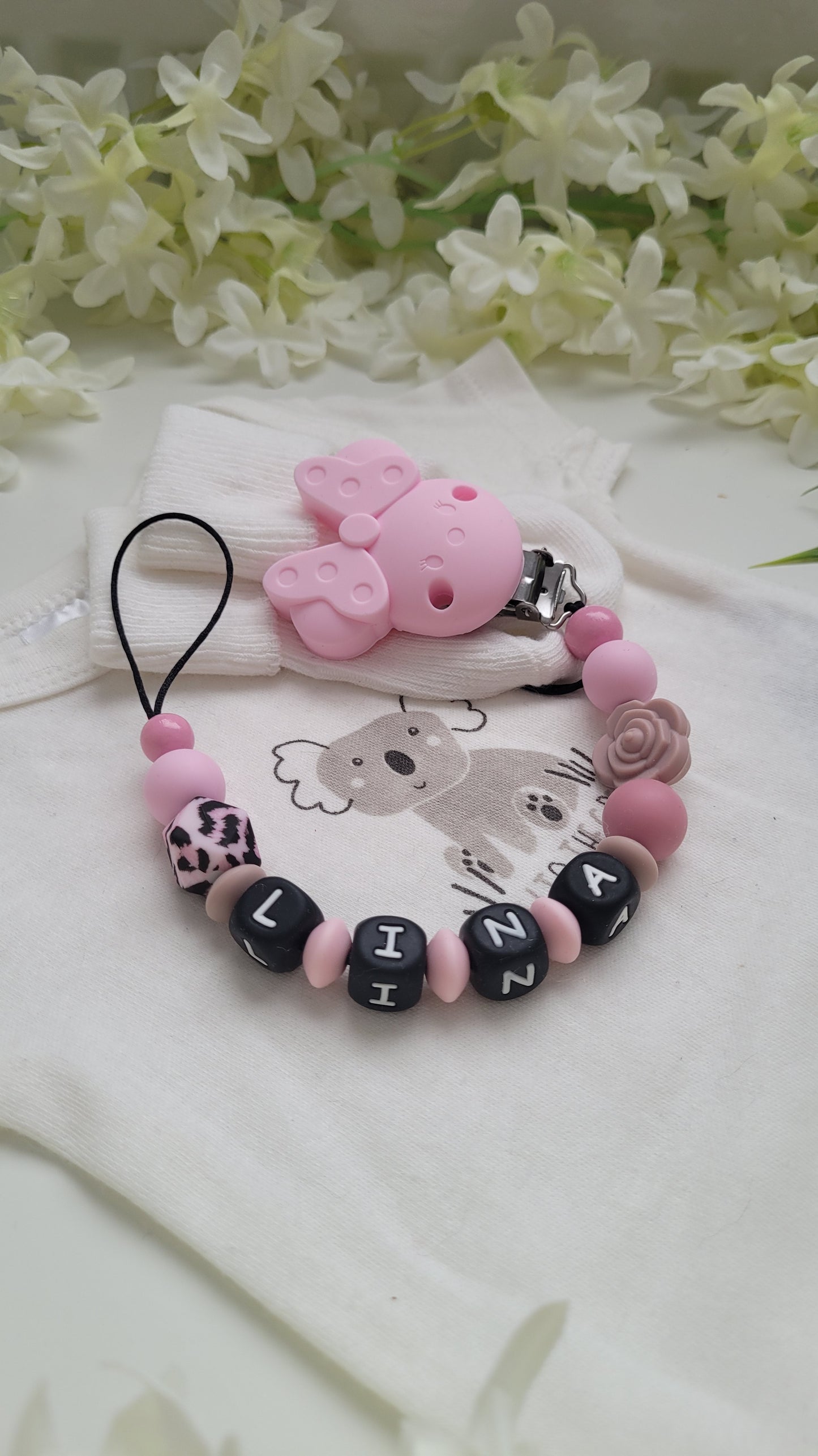 Schnullerkette mit Namen für Mädchen rosa leo