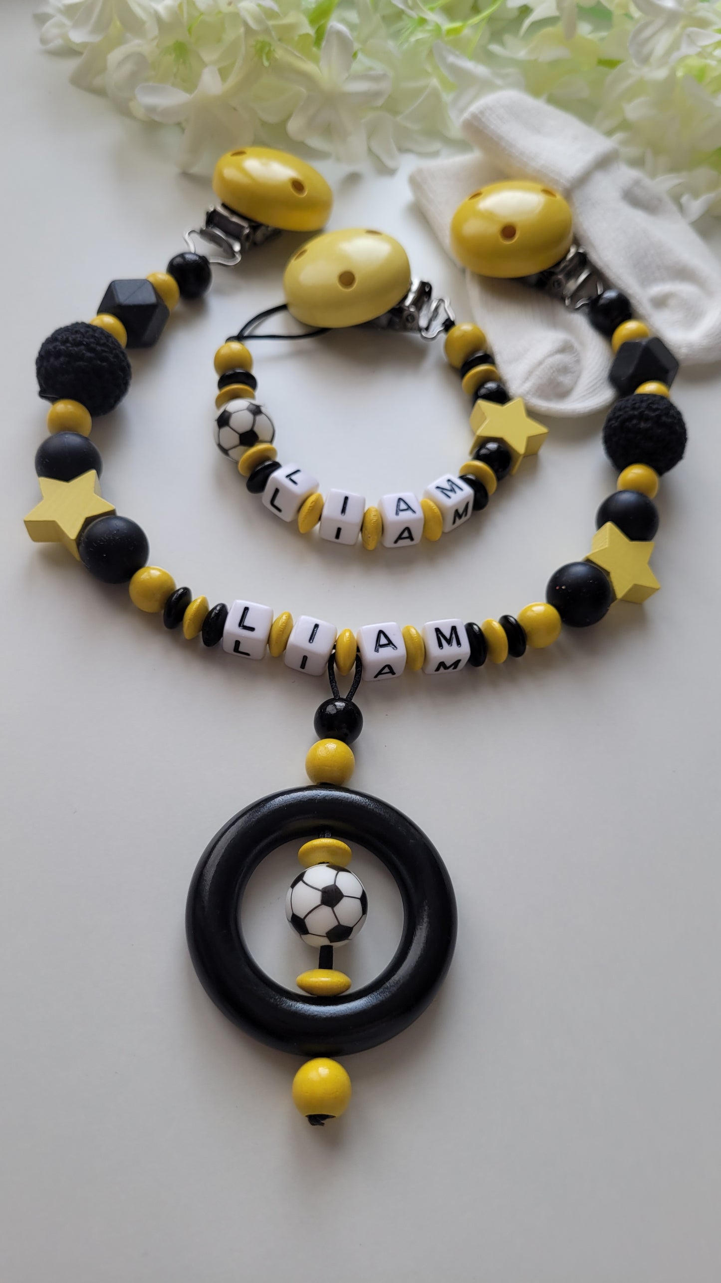 Kinderwagenkette & Schnullerkette  Fussball schwarz gelb