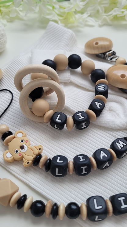 3 tlg Set Schnullerkette Kinderwagenkette Greifring Koalabärchen  Schwarz beige