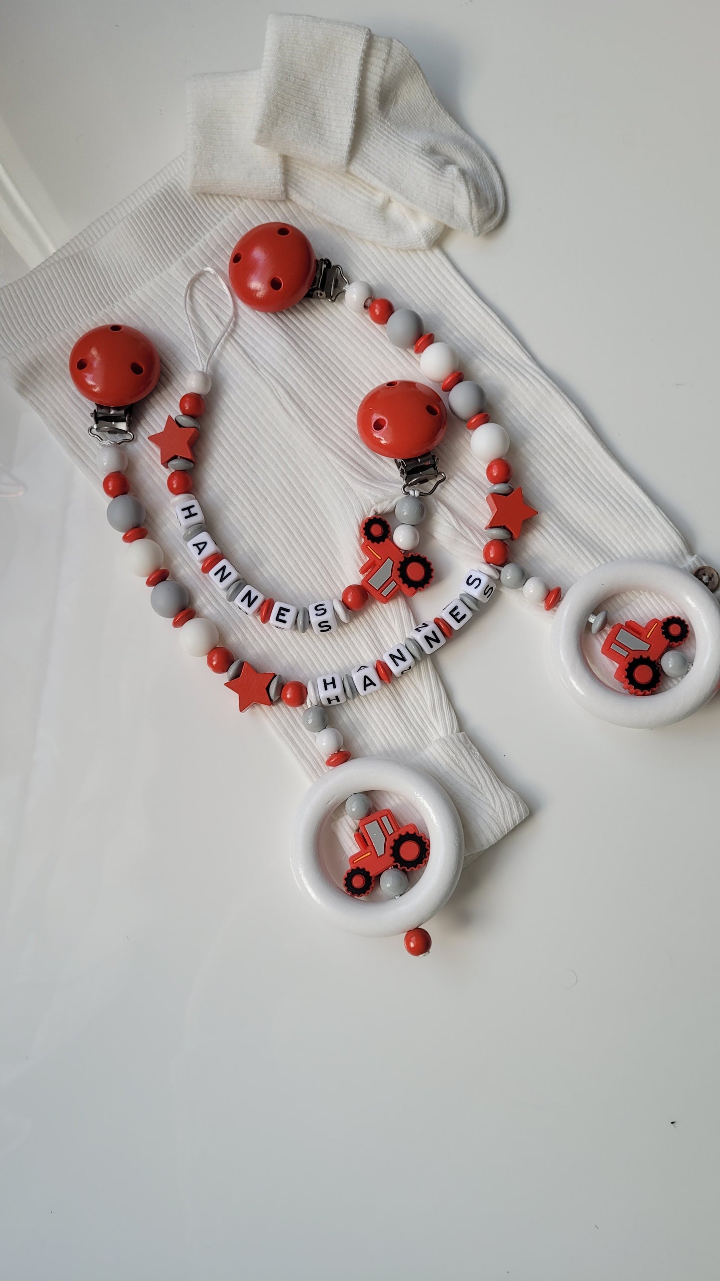 Kinderwagenkette & Schnullerkette *Traktor* rot