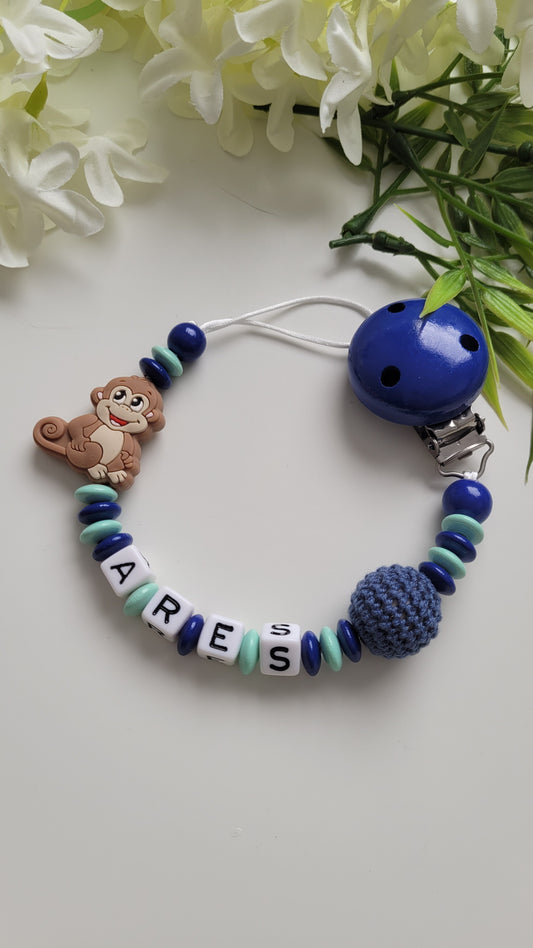 Schnullerkette mint dunkelblau mit Affenmotiv aus Silikon und Häkelperle personalisiert mit Namen 
