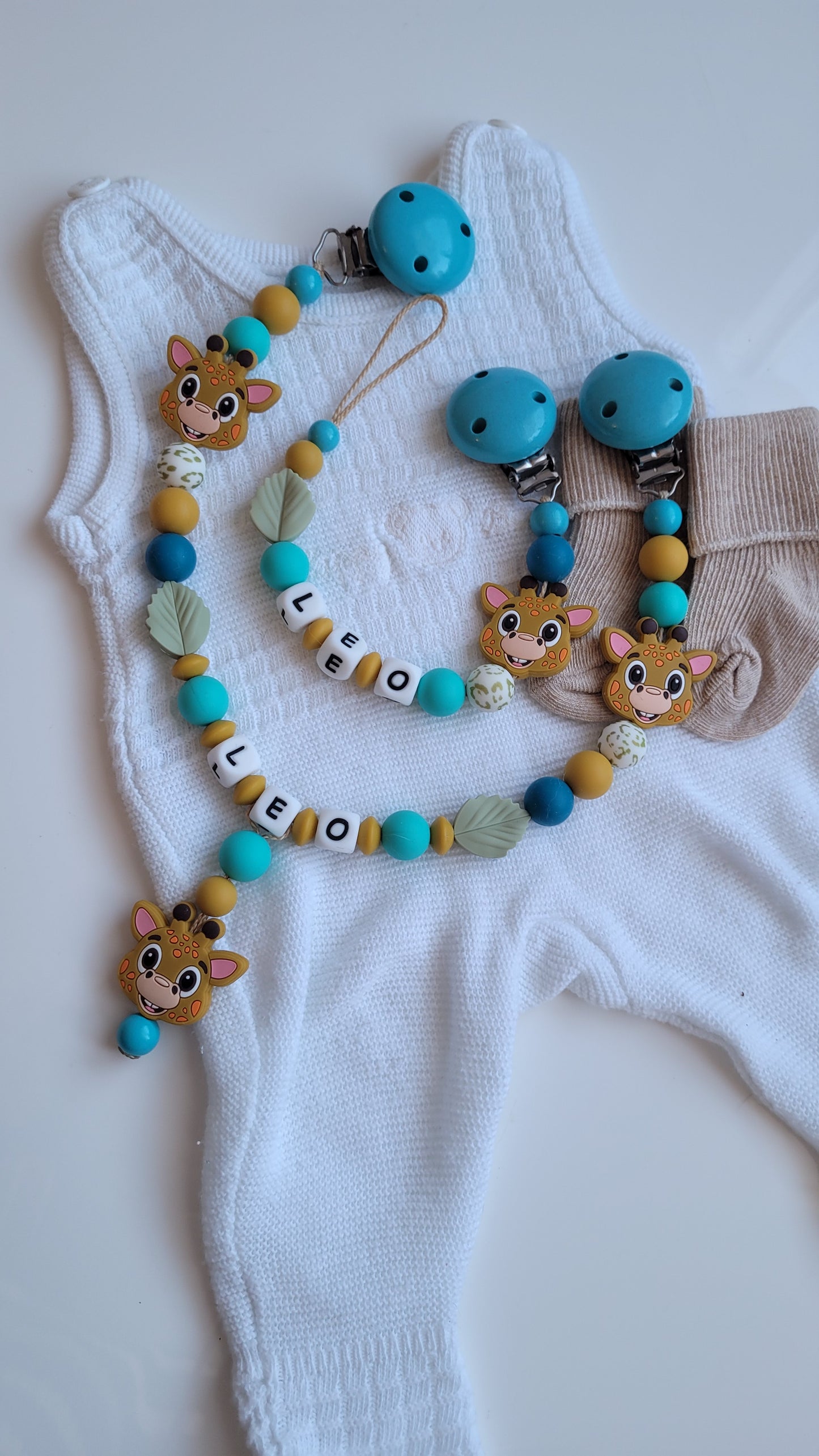 Kinderwagenkette & Schnullerkette mit Namen Giraffe türkis