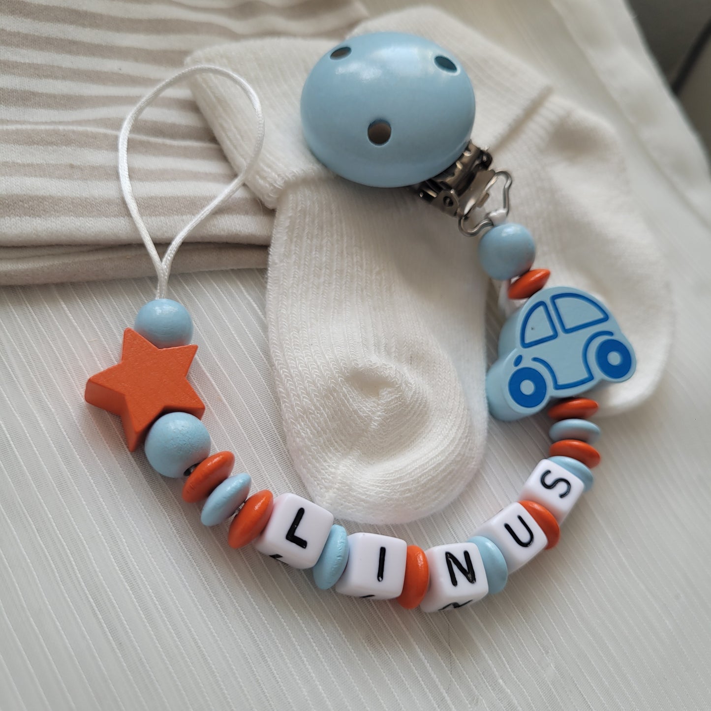 Schnullerkette für Jungen mit Namen Auto & Stern orange blau