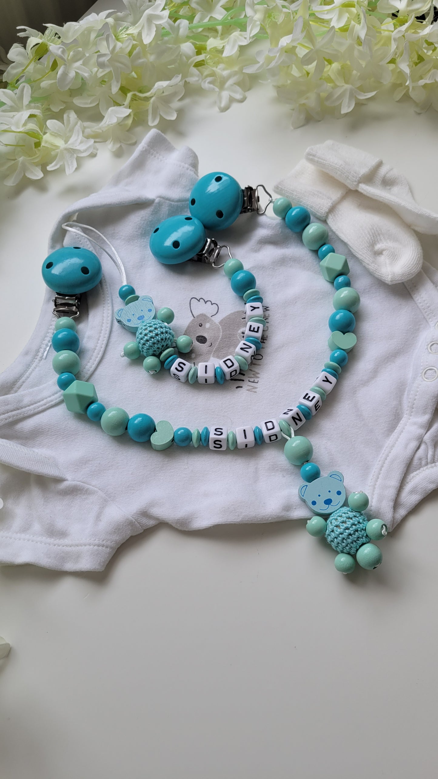 Kinderwagenkette & Schnullerkette mit Namen Teddy türkis mint