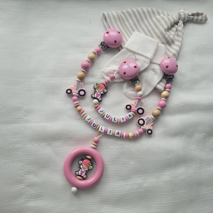 Kinderwagenkette & Schnullerkette mit Namen  Bauernhof Traktor & Kuh rosa holz