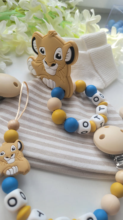 Schnullerkette Kinderwagenkette & Beissring mit Namen Löwe beige blau senfgelb