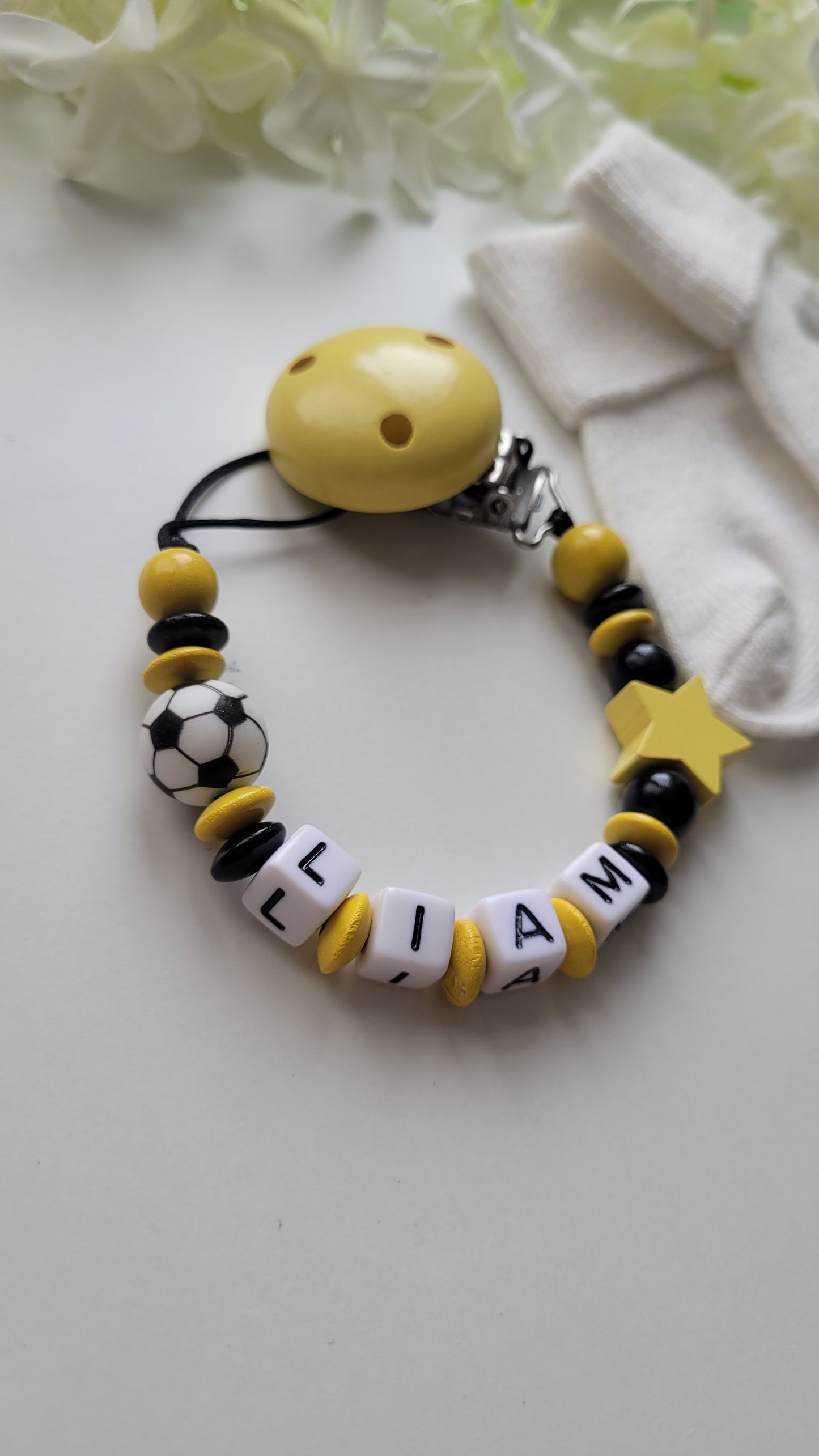 Schnullerkette mit Namen für Jungen Fussball schwarz gelb