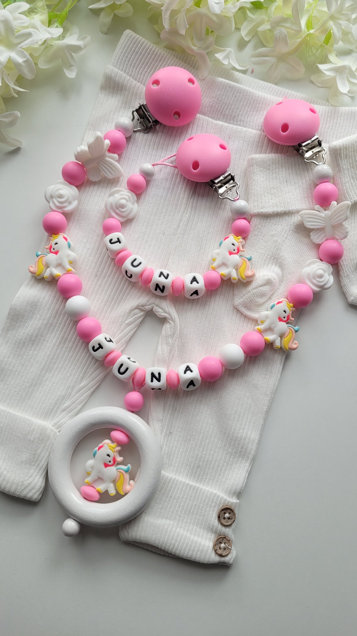 Kinderwagenkette & Schnullerkette mit Namen Kleines Regenbogen Einhorn
