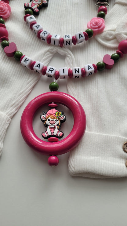 Kinderwagenkette & Schnullerkette mit Namen Kuh pink grün