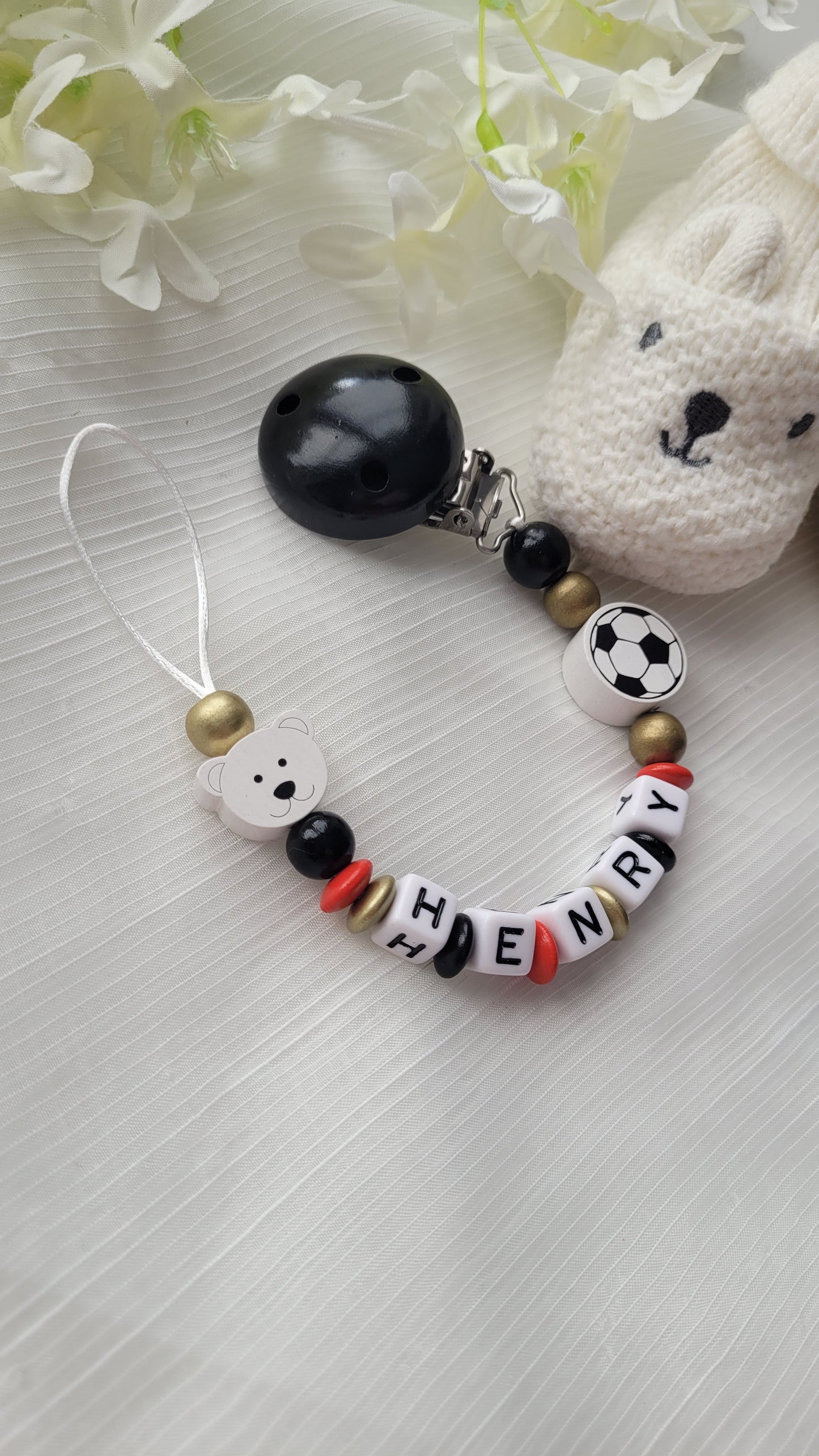 Schnullerkette mit Namen für Jungen Fussball Bärchen schwarz rot gold