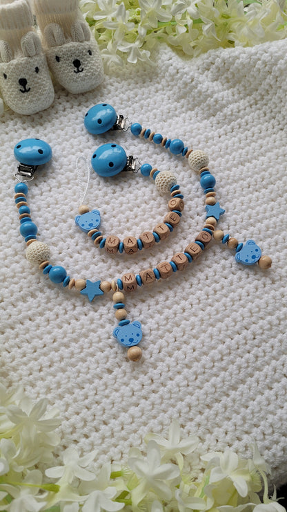 Kinderwagenkette & Schnullerkette mit Namen Teddy blau holz