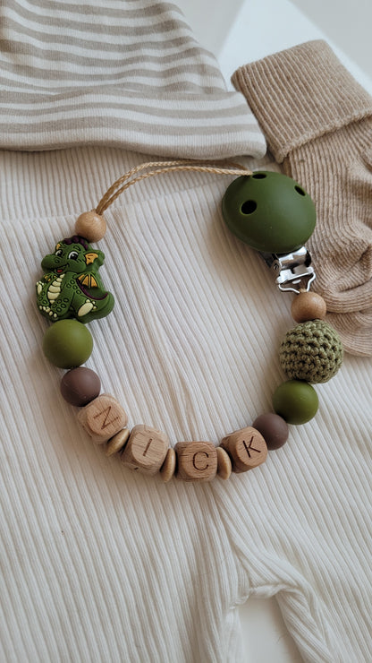 Kinderwagenkette & Schnullerkette mit Namen Drache grün holz braun