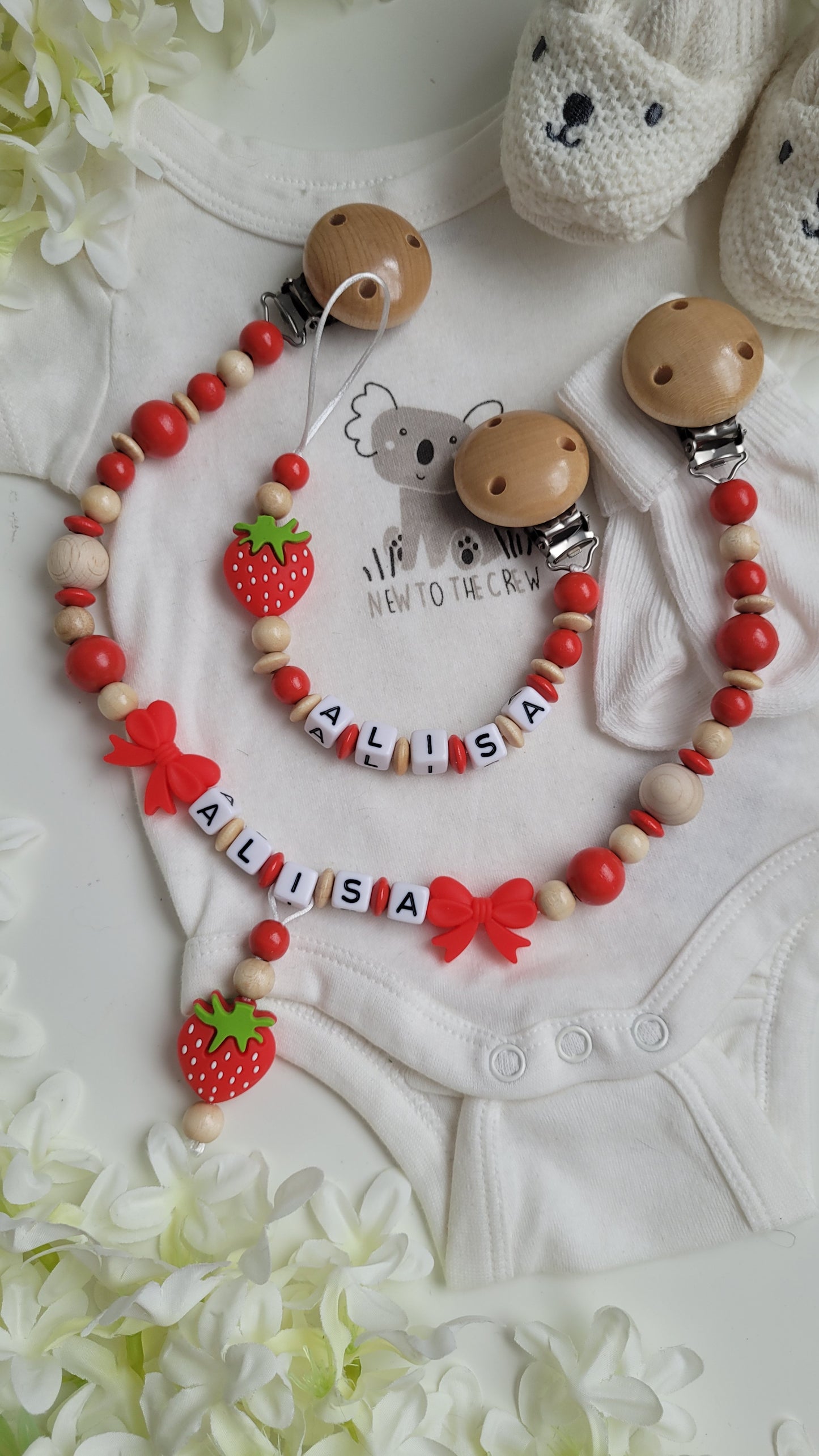 Kinderwagenkette & Schnullerkette mit Namen Erdbeertraum rot holz