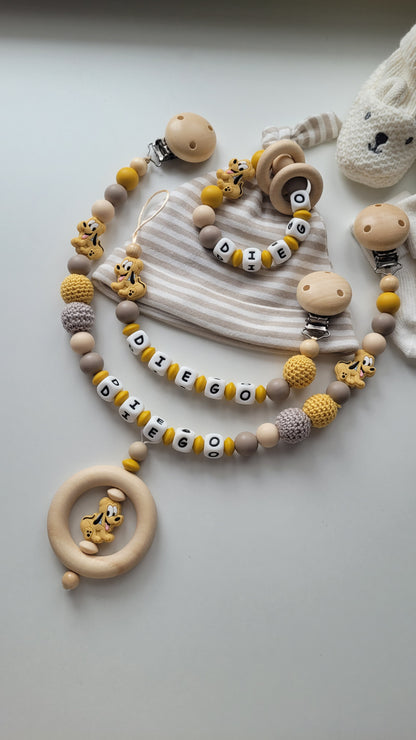 Schnullerkette Kinderwagenkette & Beissring mit Namen Hund beige graubraun gelb