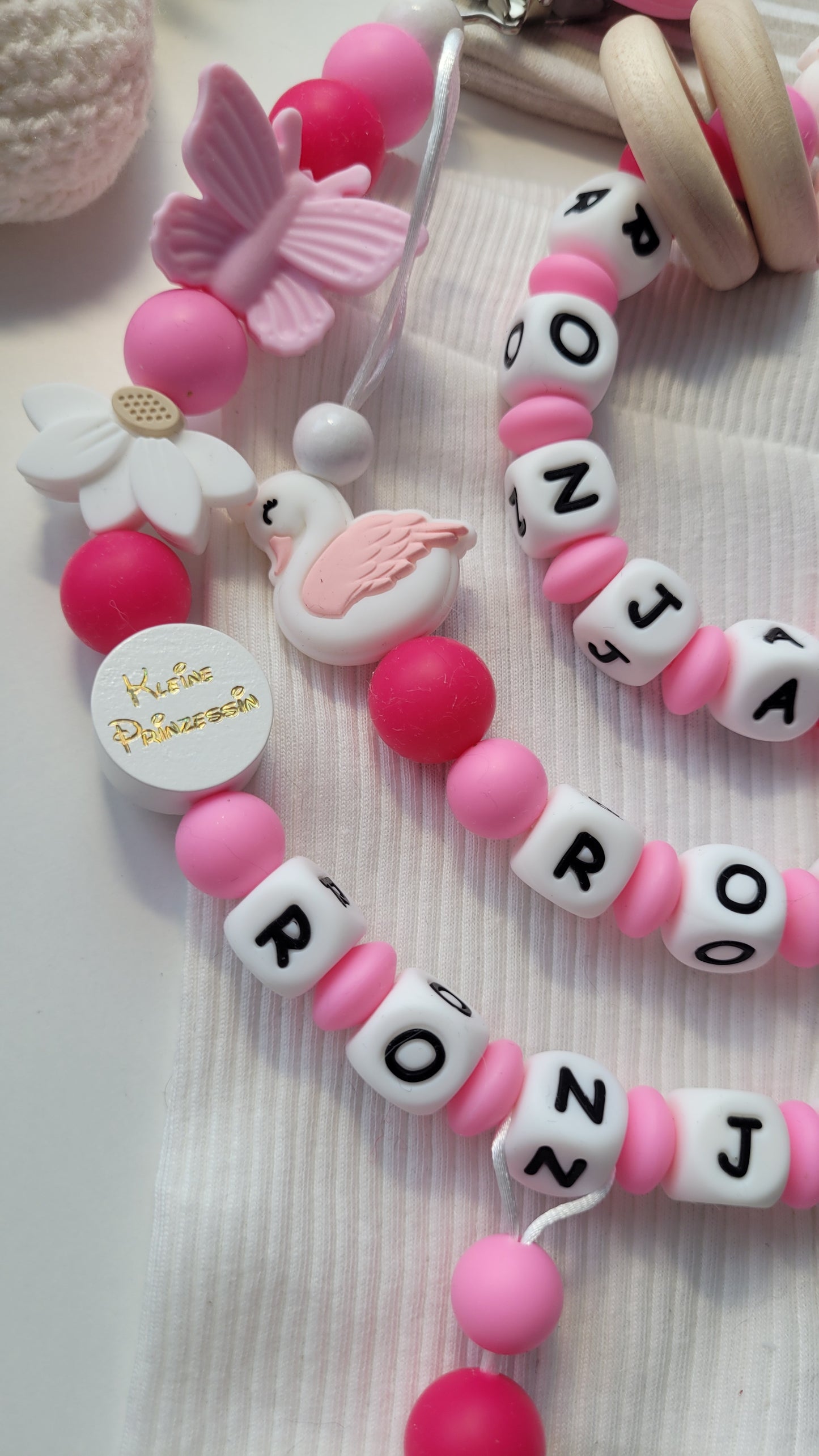 3er Set Schnullerkette Kinderwagenkette & Greifring Schwan & Blumen pink