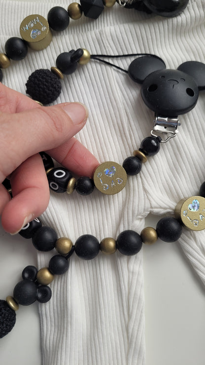 Kinderwagenkette & Schnullerkette mit Namen schwarz gold