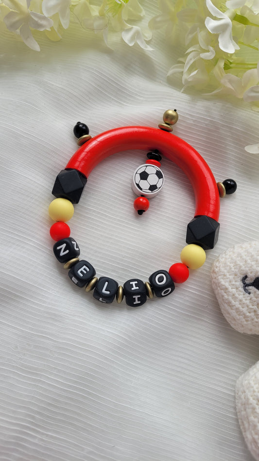 Motorik Greifring mit Namen Fussball