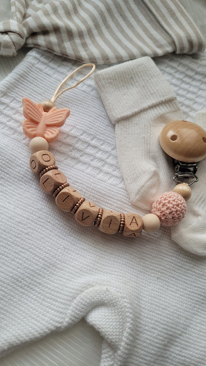 Schnullerkette mit Namen für Mädchen Schmetterling apricot beige